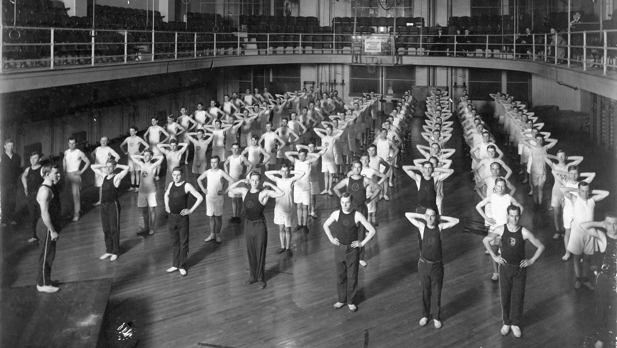 Men participate in an exercise class at Detroit's YMCA in 1910.