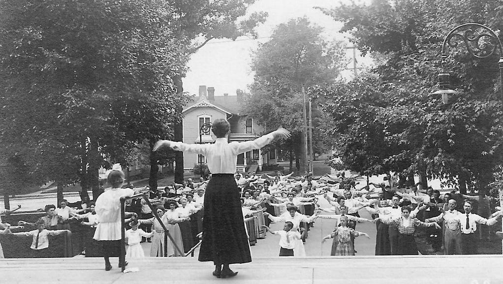 Breathing exercises are conducted at the Battle Creek Sanitarium circa 1900. The health resort opened in 1866 and was world renowned as a place for the rich and famous to learn the principles of a healthy lifestyle.  Fresh air, exercise, frequent enemas and a low-fat, low-protein diet were practiced.  Treatment methods included hydrotherapy, phototherapy, electrotherapy and mechanotherapy.