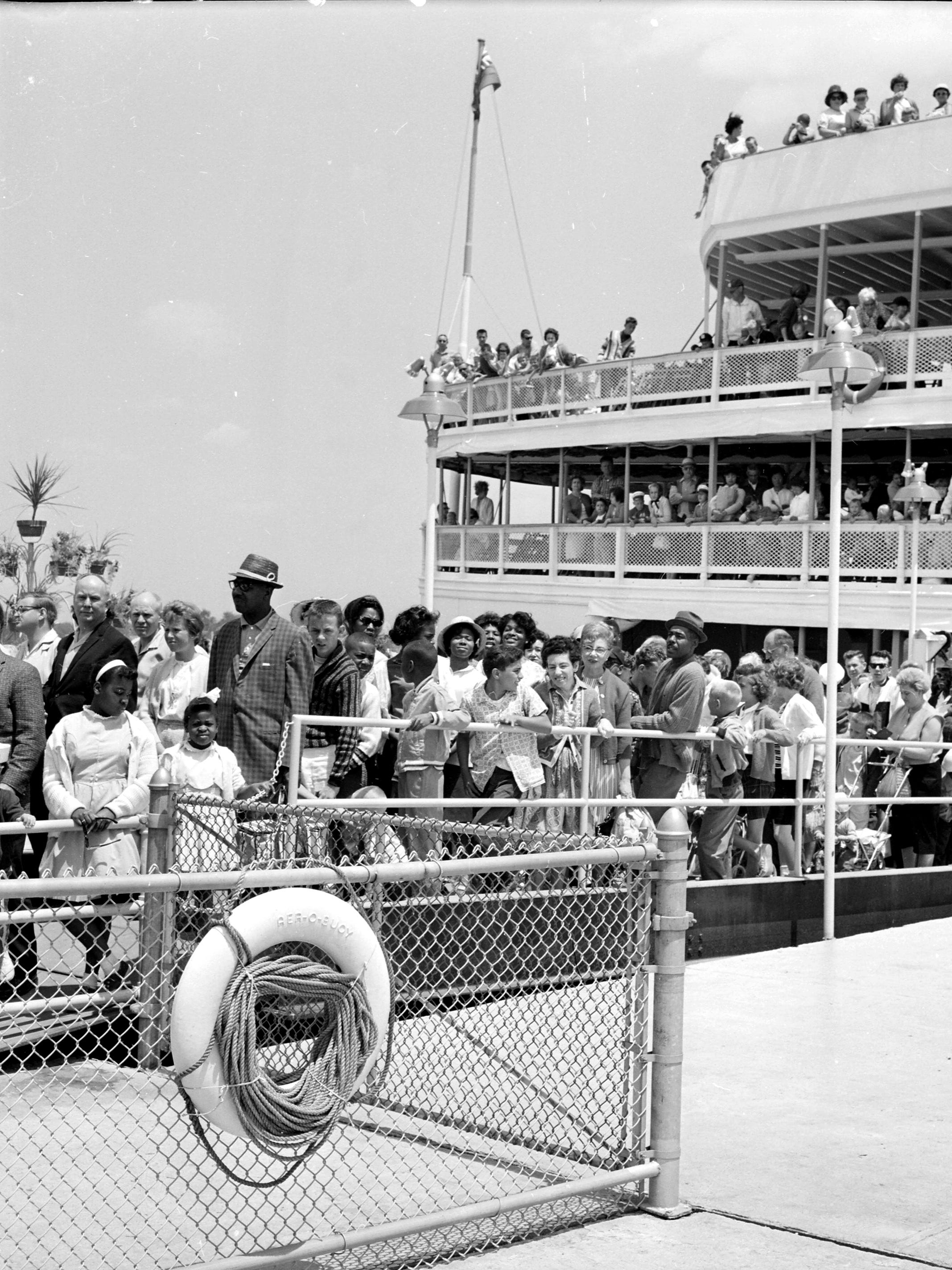 Passengers disembark from one of the Boblo boats in July 1963.