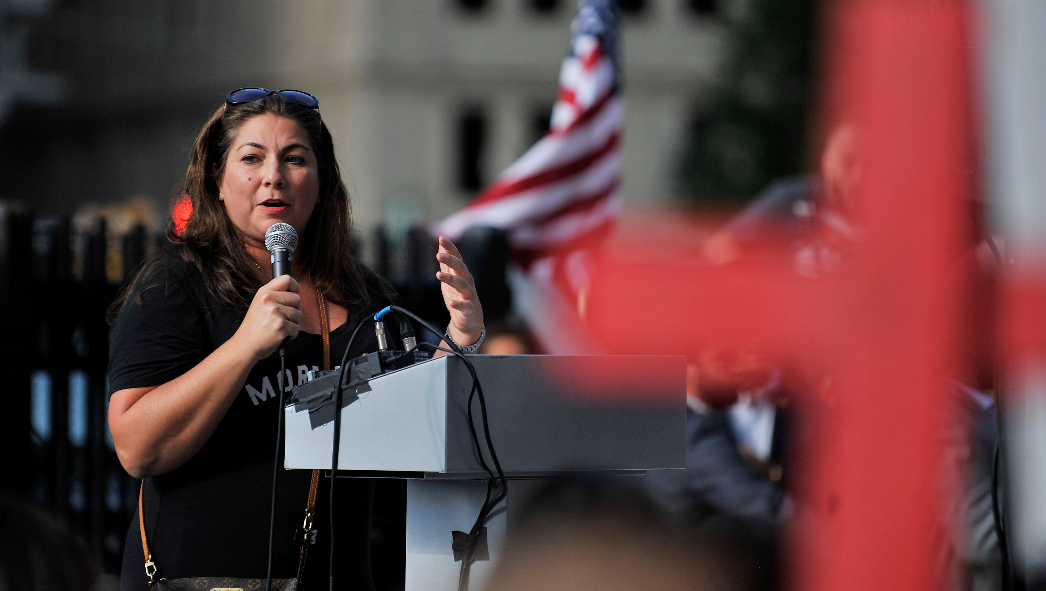 At a rally outside the federal courthouse in Detroit Crystal Kassab Jabiro talks about the impact on the children of the people who have been detained
