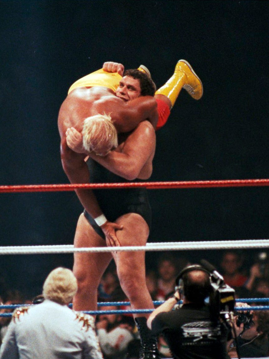 Andre the Giants picks up 300-pound Hulk Hogan like a rag doll at WrestleMania III.