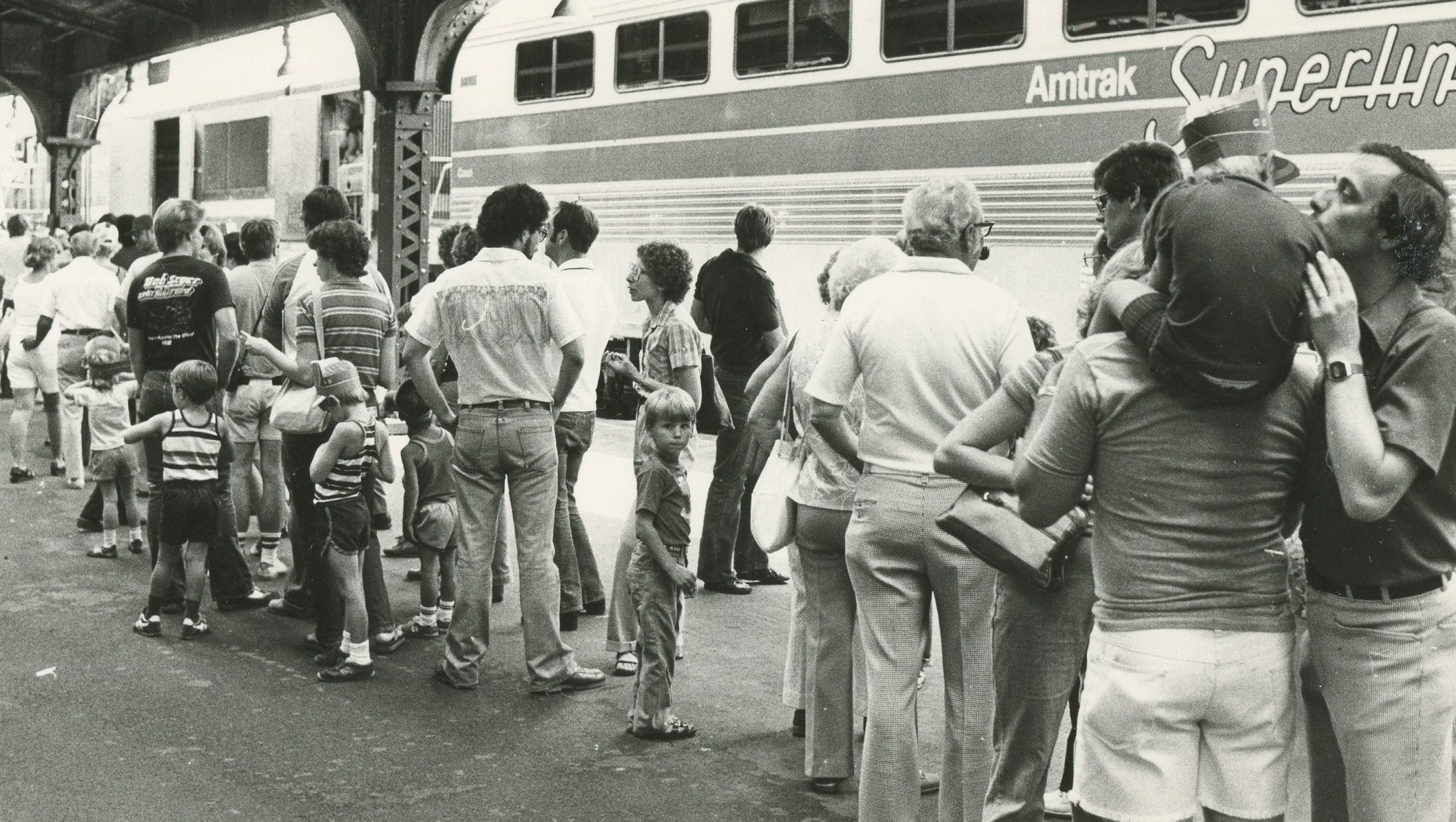 Passengers line up for an Amtrak train on August 2, 1980.
