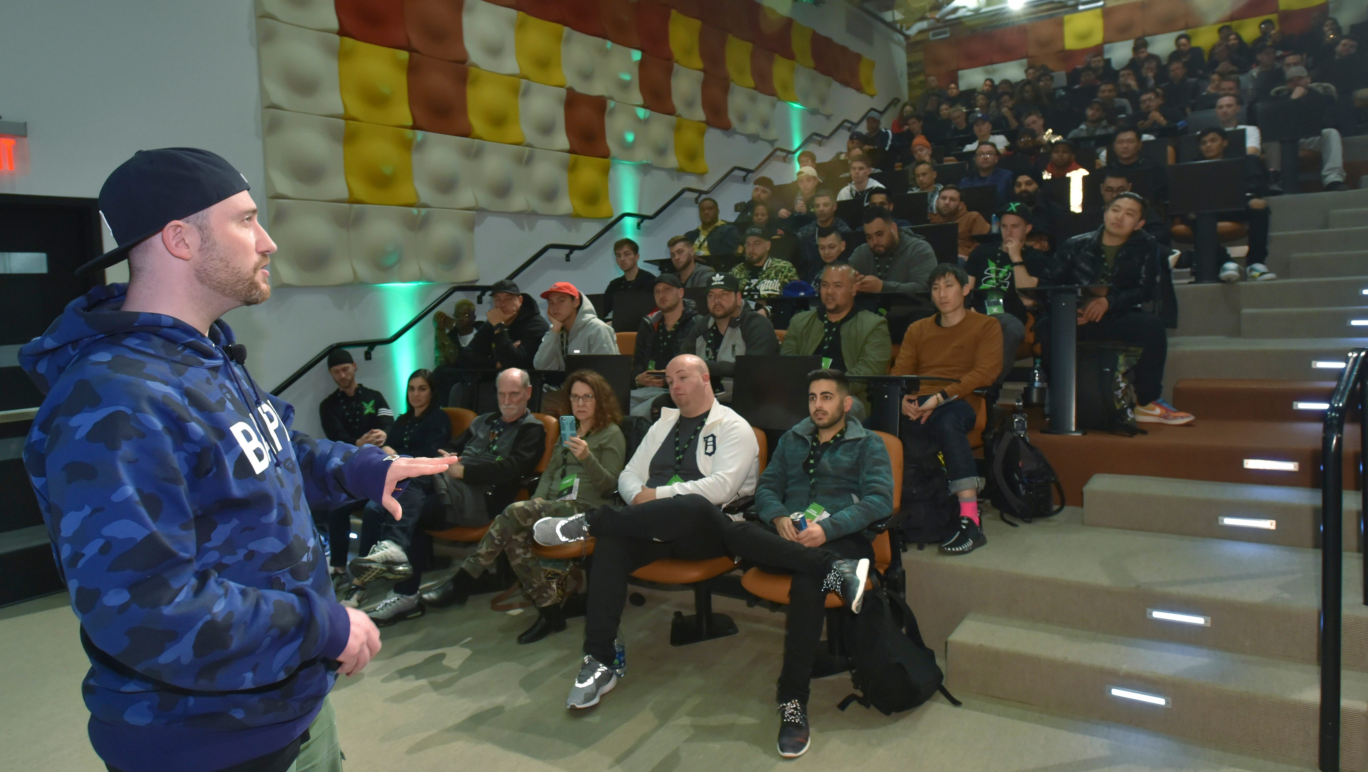 Buyers, sellers and sneake fashion fans listen to StockX CEO and co-founder Josh Luber during the StockX Day2 event in Detroit recently.