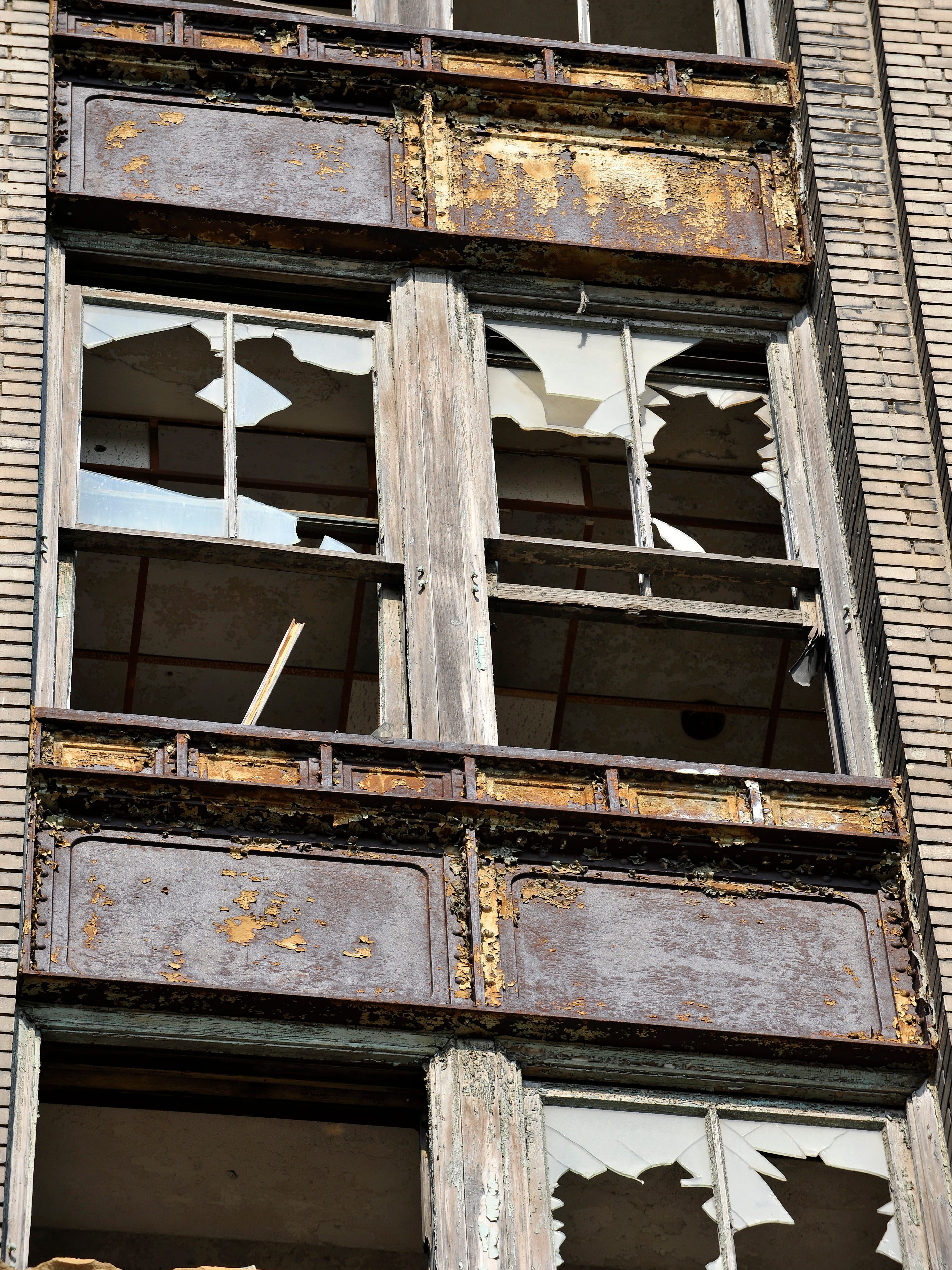 Broken windows are a common sight at the  old train station in 2011.
