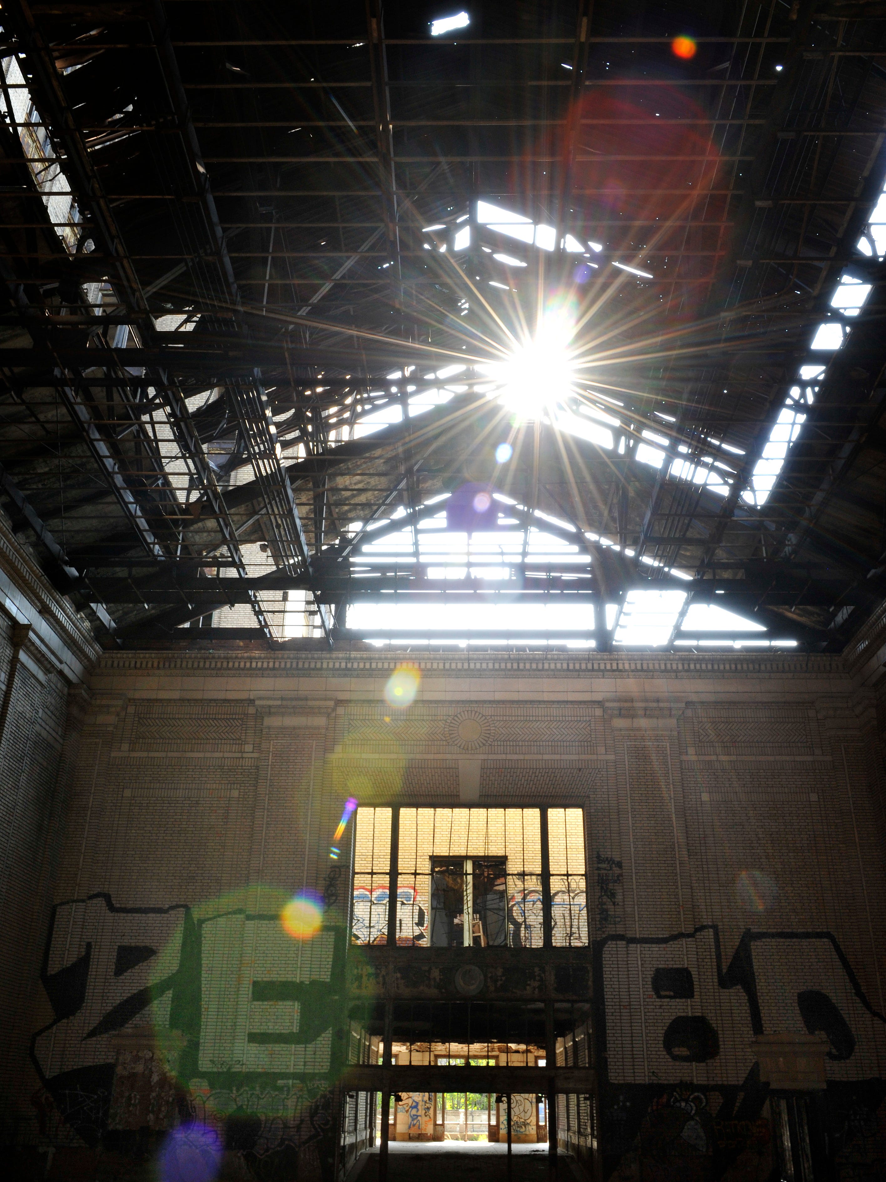 Sunlight streams through gaping holes in the station's roof in 2011.