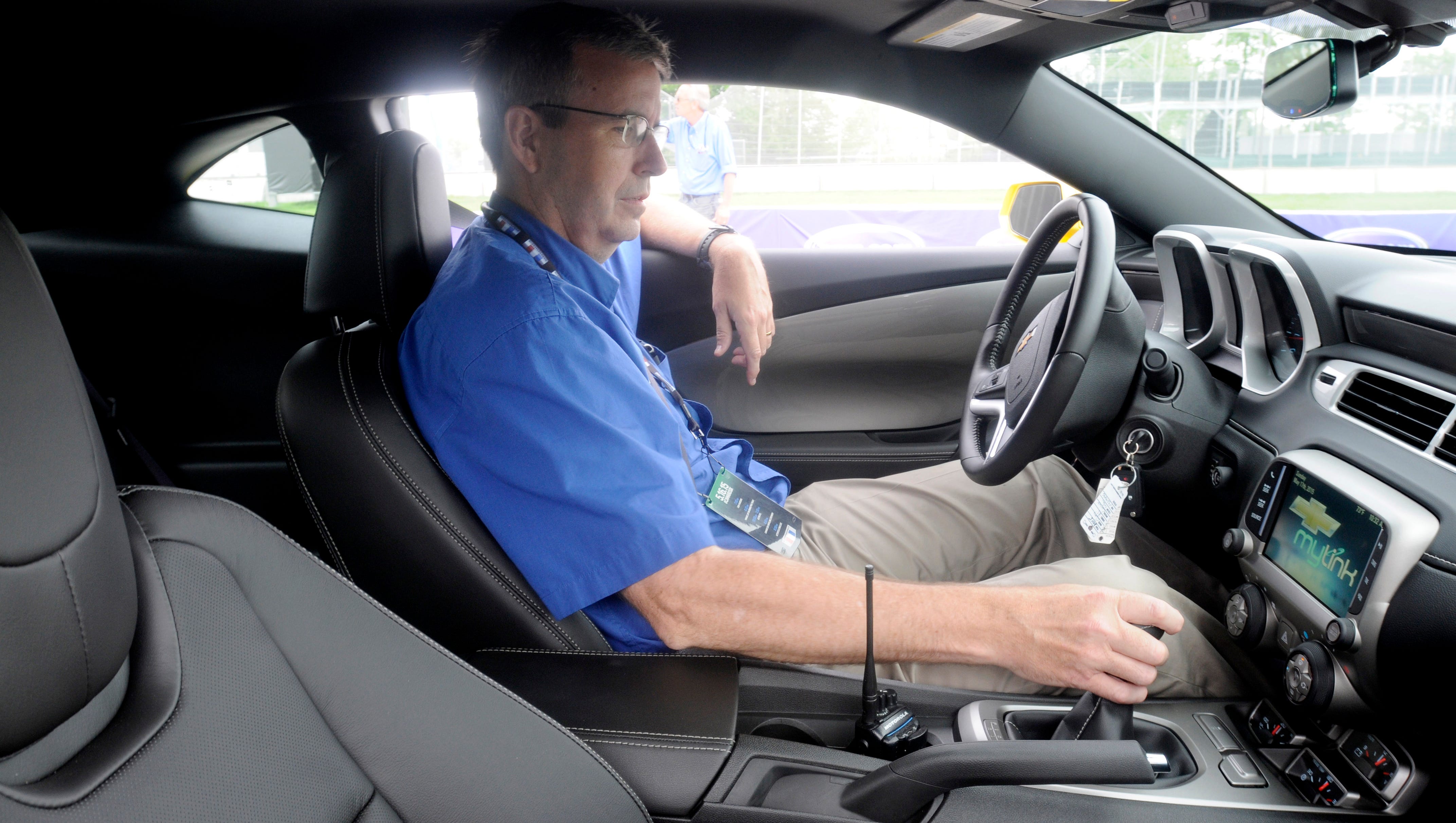 Detroit News auto critic Henry Payne prepares to takes out the 2016 Camaro mule car for a test drive.