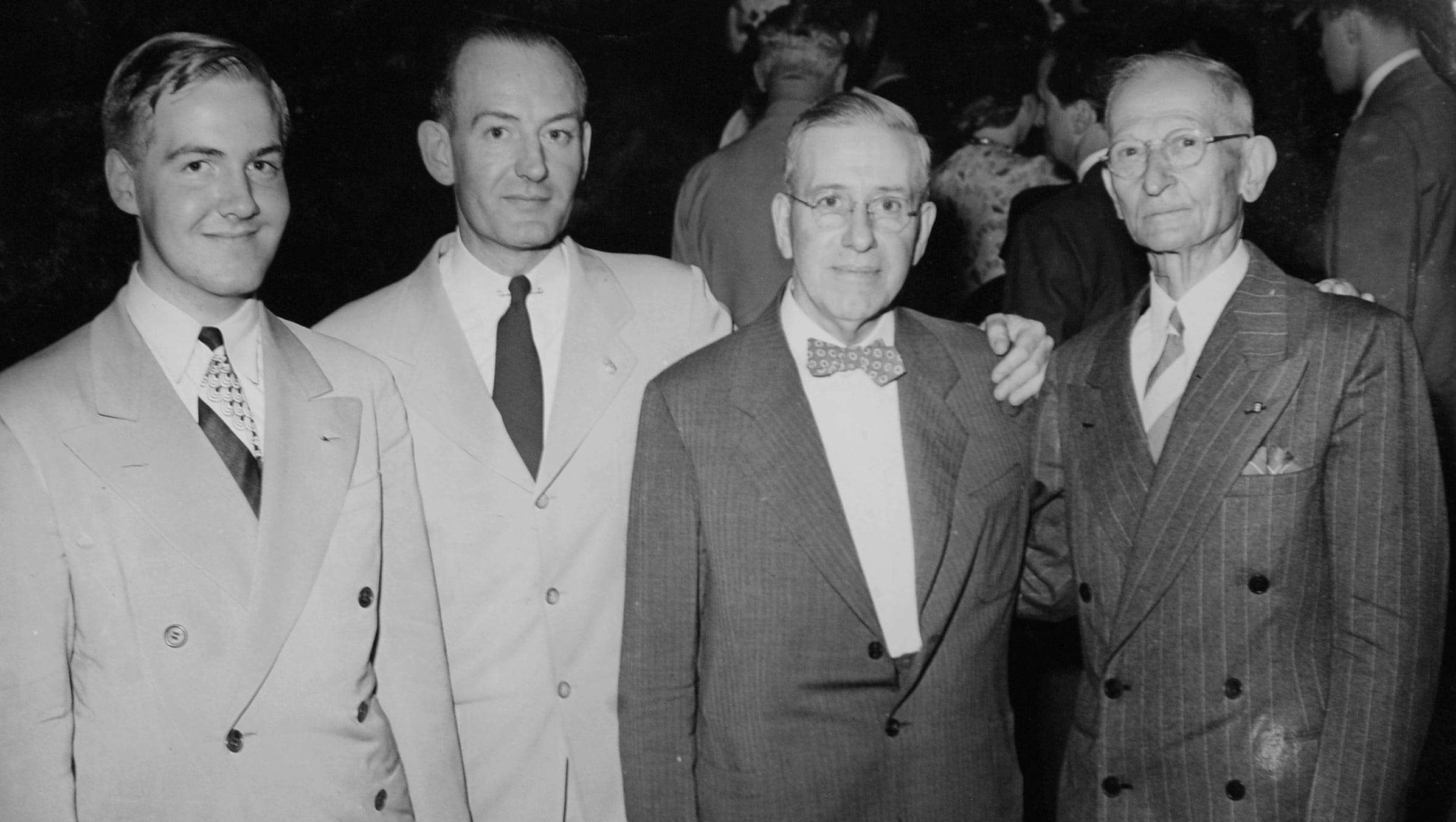 Three generations of the Scripps family attend WWJ's 25th birthday party in 1945:  From left,  William E. Scripps II;  Willliam J. Scripps, general manager of WWJ; and his father Detroit News Publisher William E. Scripps.  At right is Tom Clark, an early radio experimenter who was a key adviser in the creation of the WWJ.