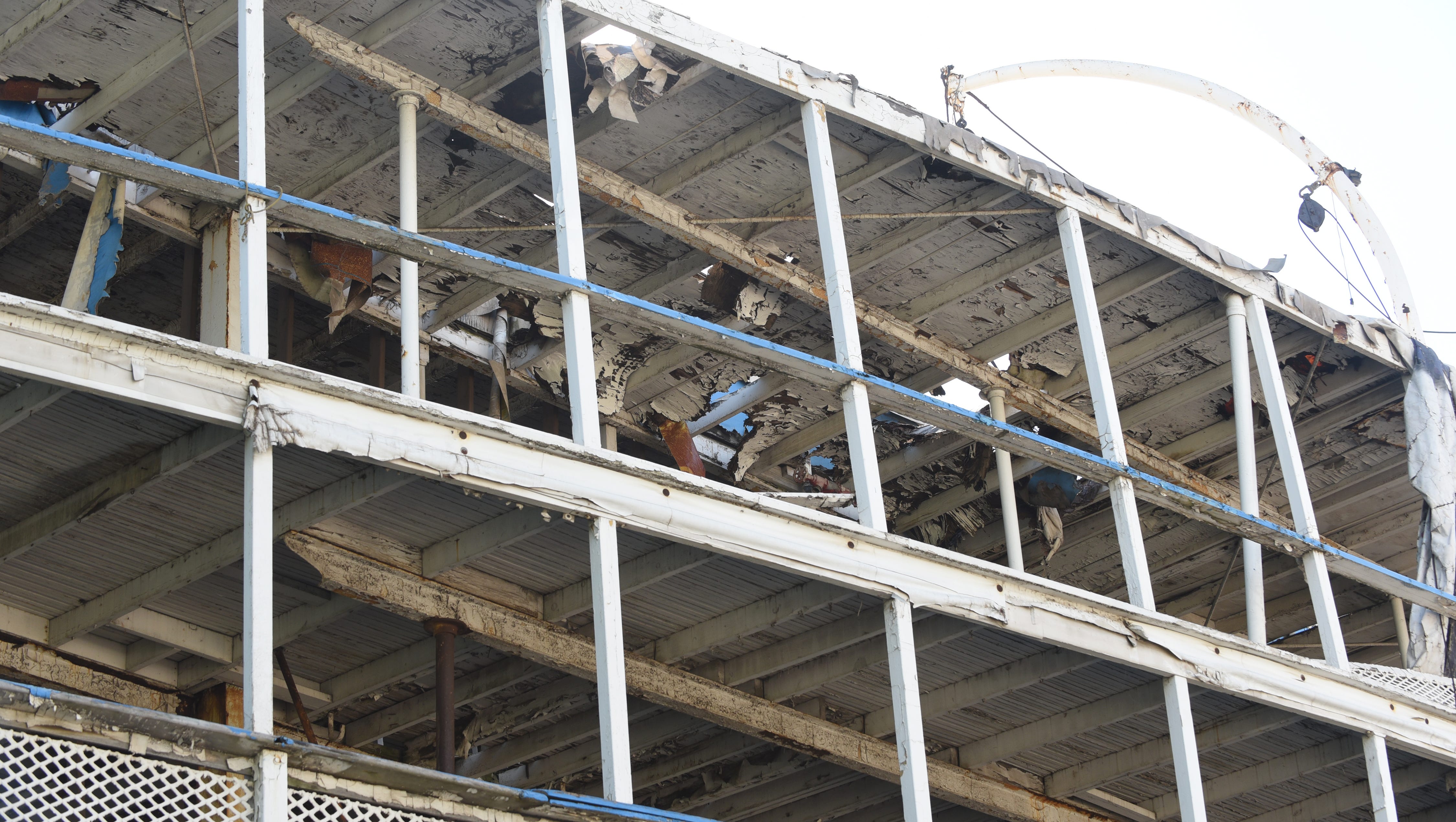 The upper decks of the boat show   deterioration.