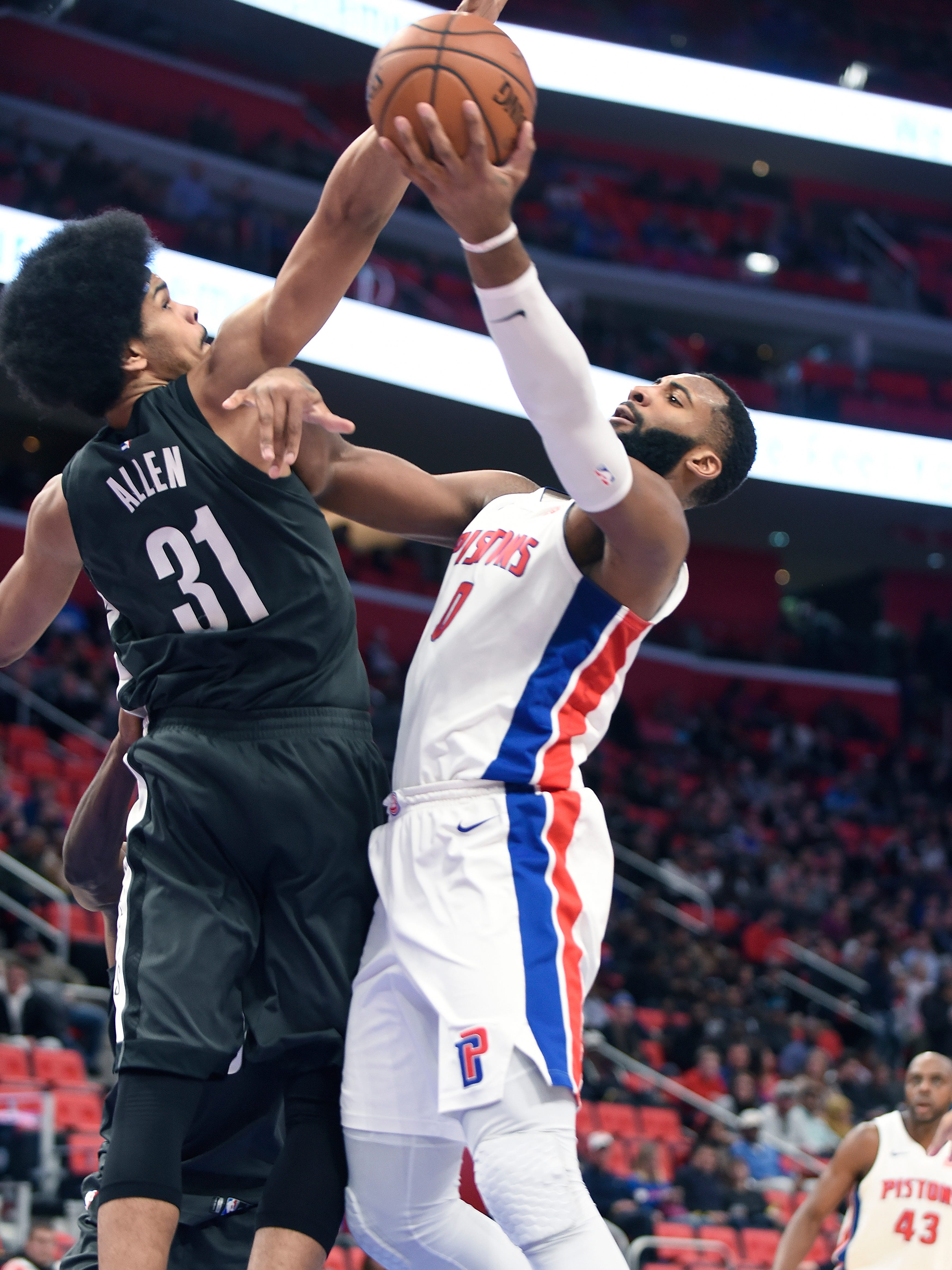 Pistons' Andre Drummond shoots over Nets' Jarrett Allen in the fourth quarter.