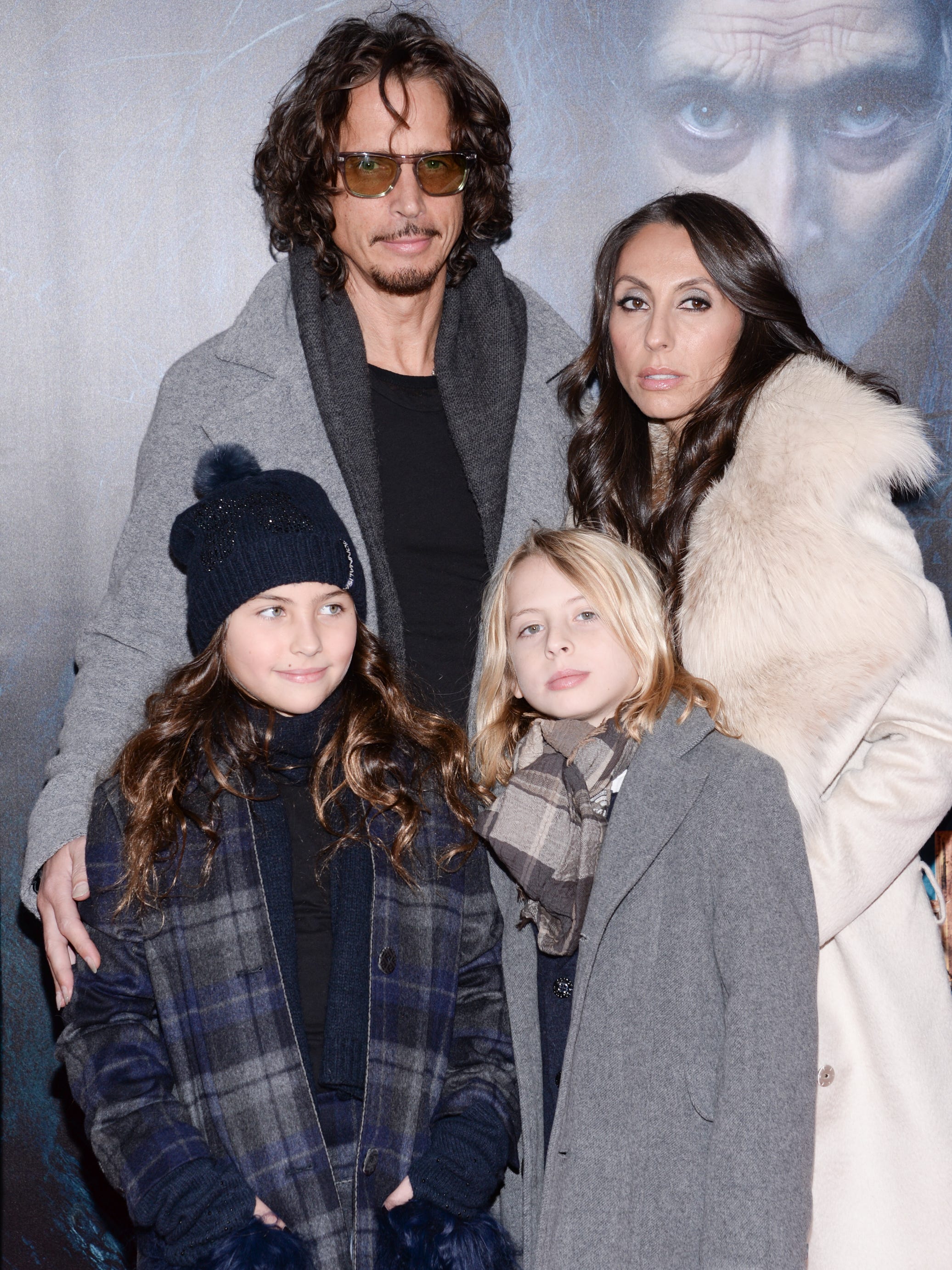 Chris Cornell poses with his wife Vicky and their children at the premiere of "Into The Woods" at the Ziegfeld Theatre, Dec. 8, 2014, in New York.