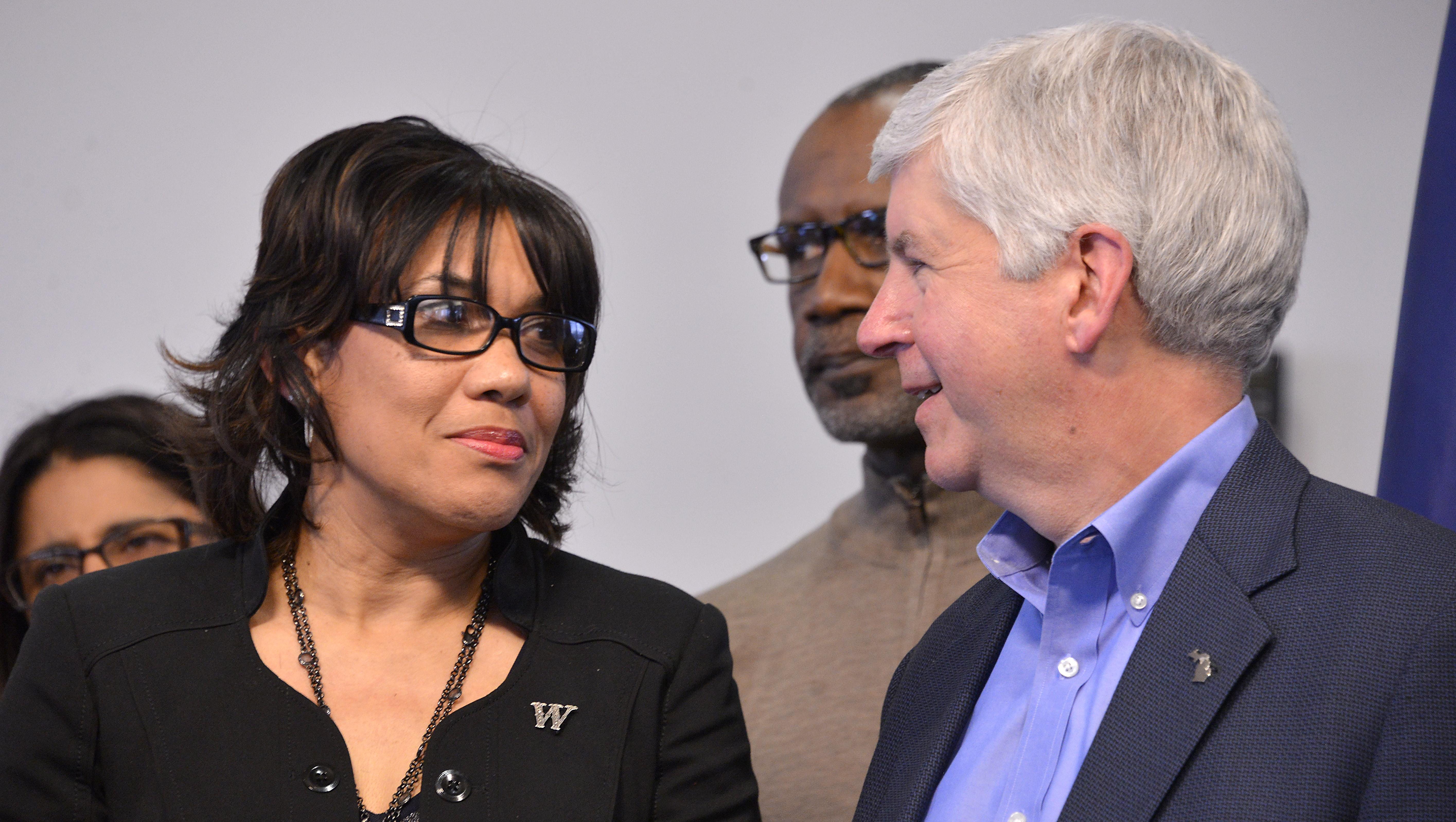 Gov Rick Snyder and Flint Mayor Karen Weaver speak at a news conference Monday, Jan 11, 2016 at Flint City Hall about the city's water crisis. The U.S. Environmental Protection Agency has sided with the state in a battle over whether the city of Flint should be forced to sign a consent order requiring fixes to the city’s water system.
