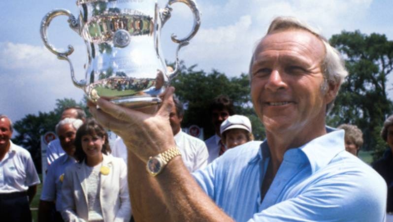 Arnold Palmer poses with the U.S. Senior Open trophy after winning in 1981 at Oakland Hills.