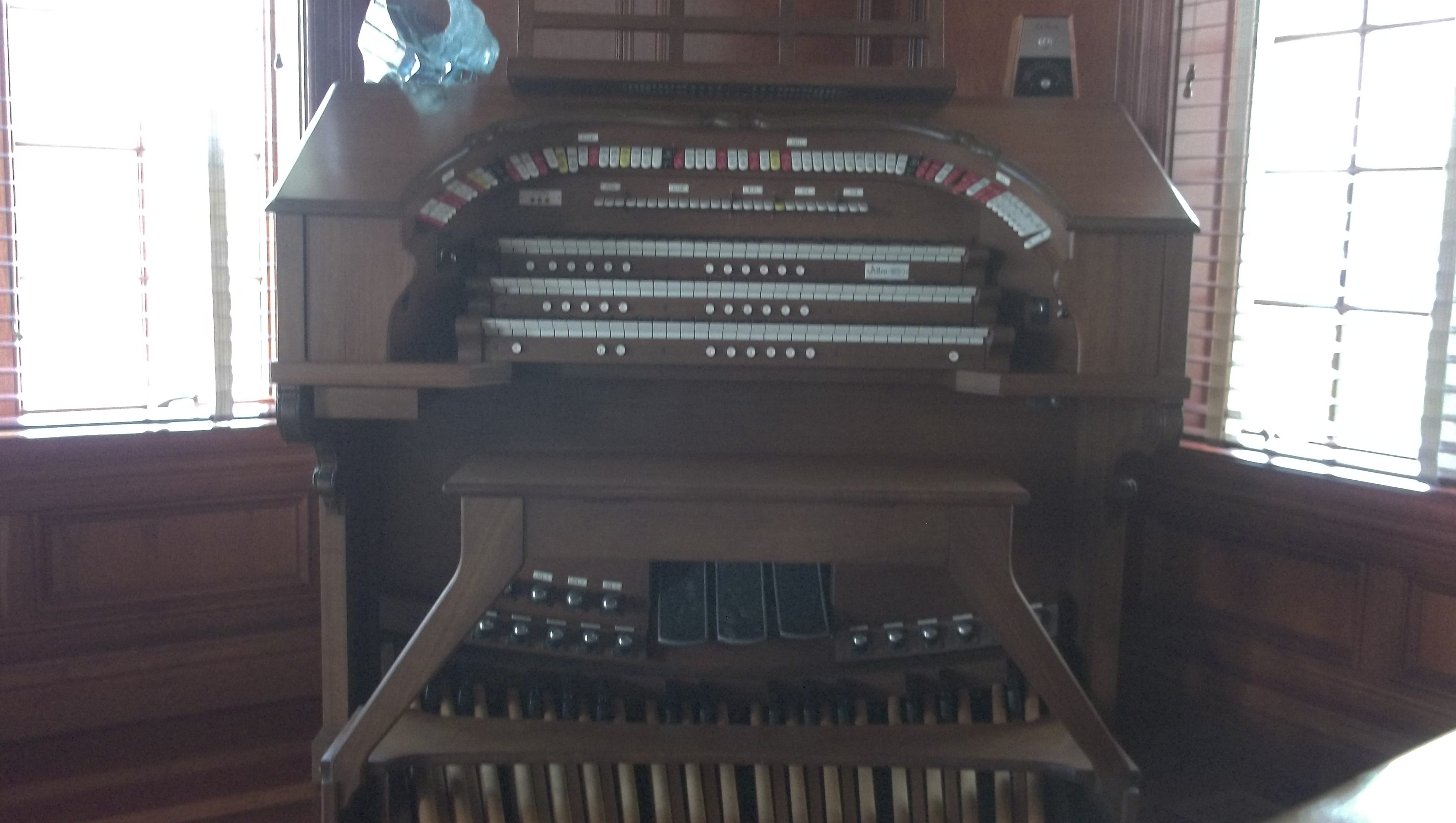 One of several pipe organs in the home.