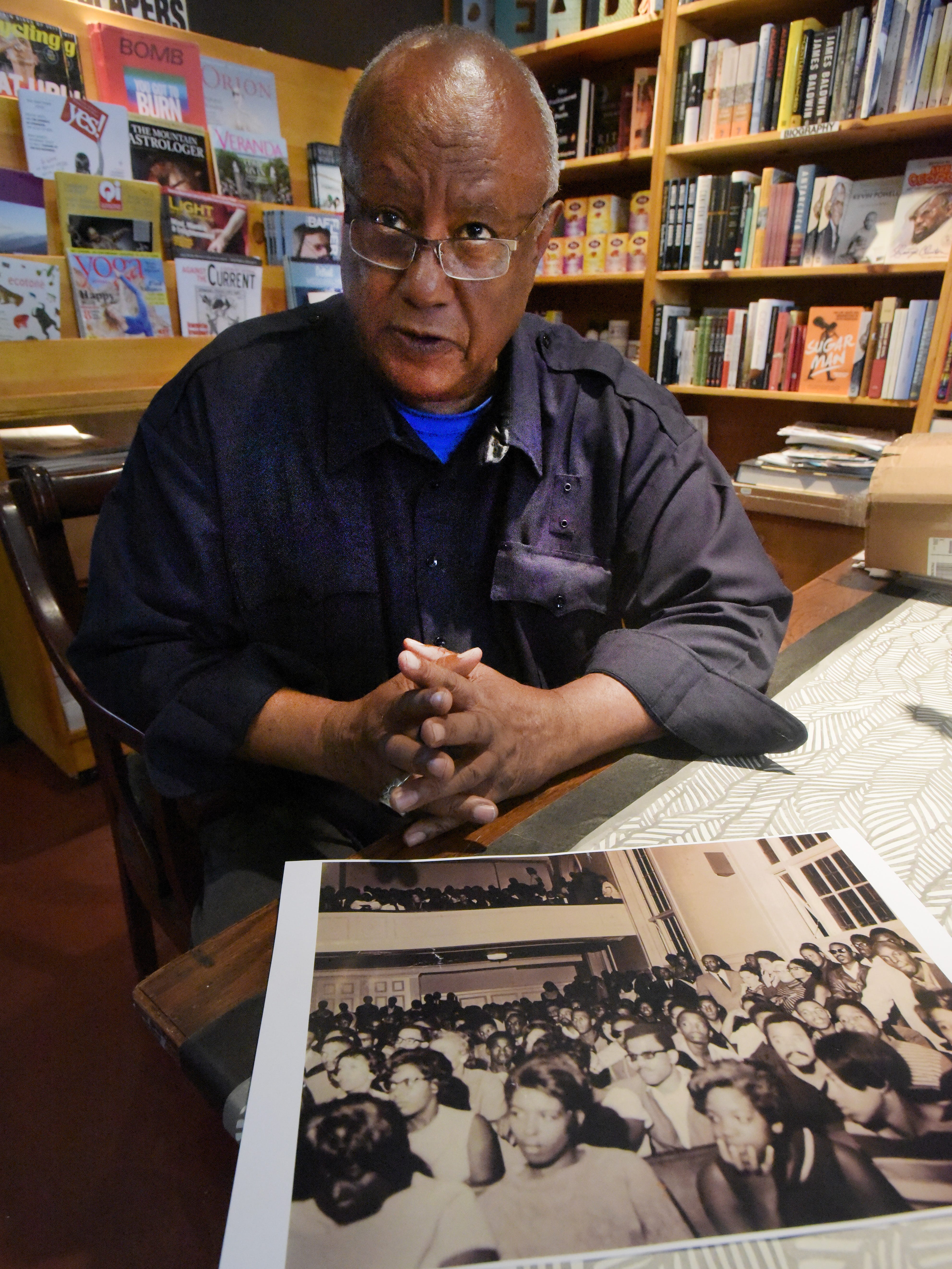 Rev. Dan Aldridge, 75, shows a photo from the tribunal he  organized after the slayings, an attempt to duplicate a real courtroom trial and get to the facts.  A jury of white and black citizens, including Rosa Parks, found the defendants guilty on all counts.