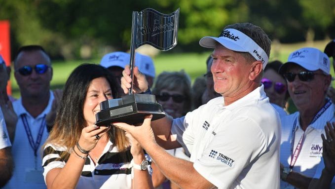 Paul Broadhurst is awarded the trophy for winning the inaugural Ally Challenge in September 2018. It was a Champions Tour event.