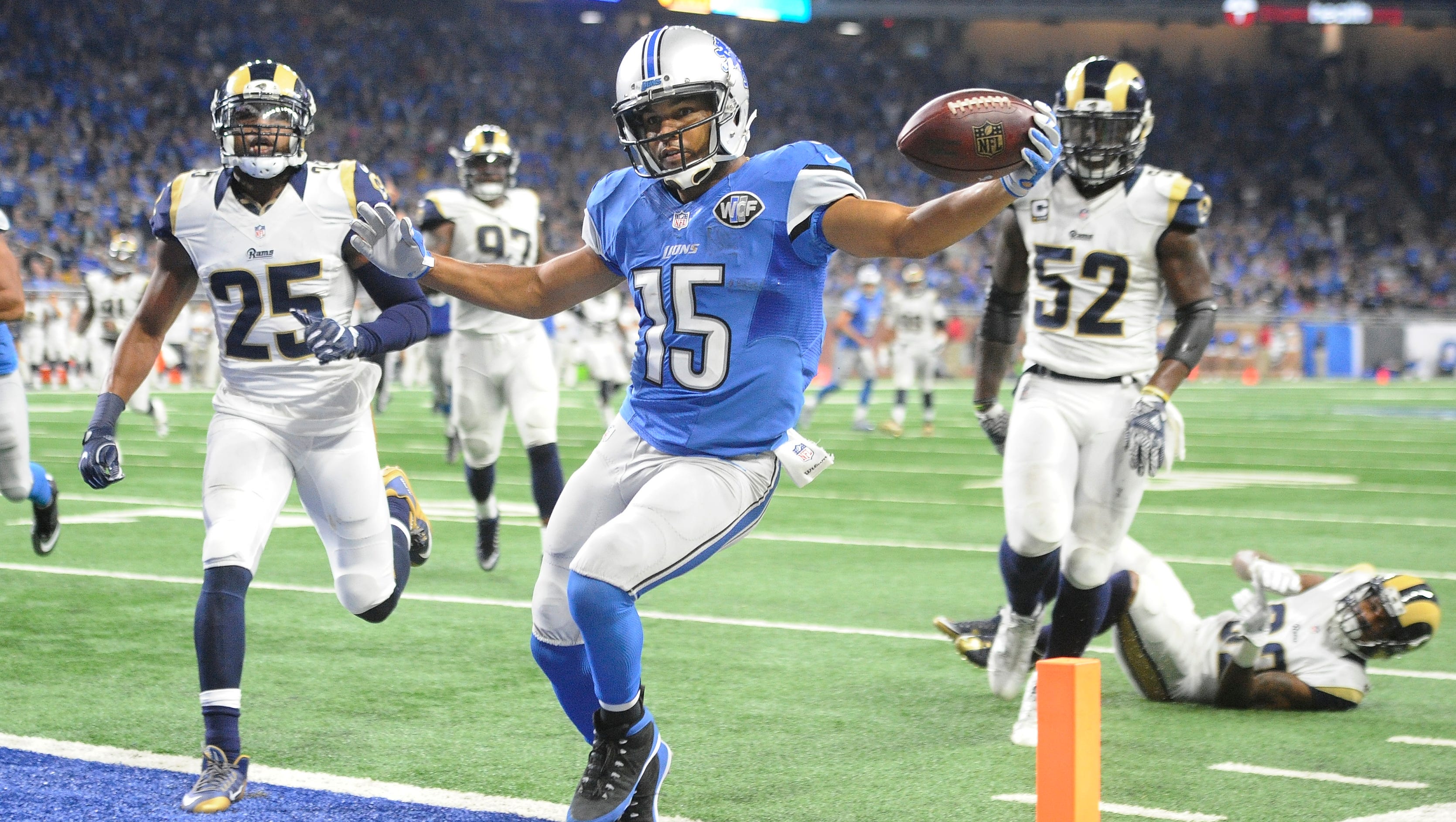 Lions wide receiver Golden Tate tip-toes into the end zone for a touchdown, to tie the score at 28 late in the fourth quarter of the 31-28 victory over the Los Angeles Rams at Ford Field in Detroit on October 16, 2016.