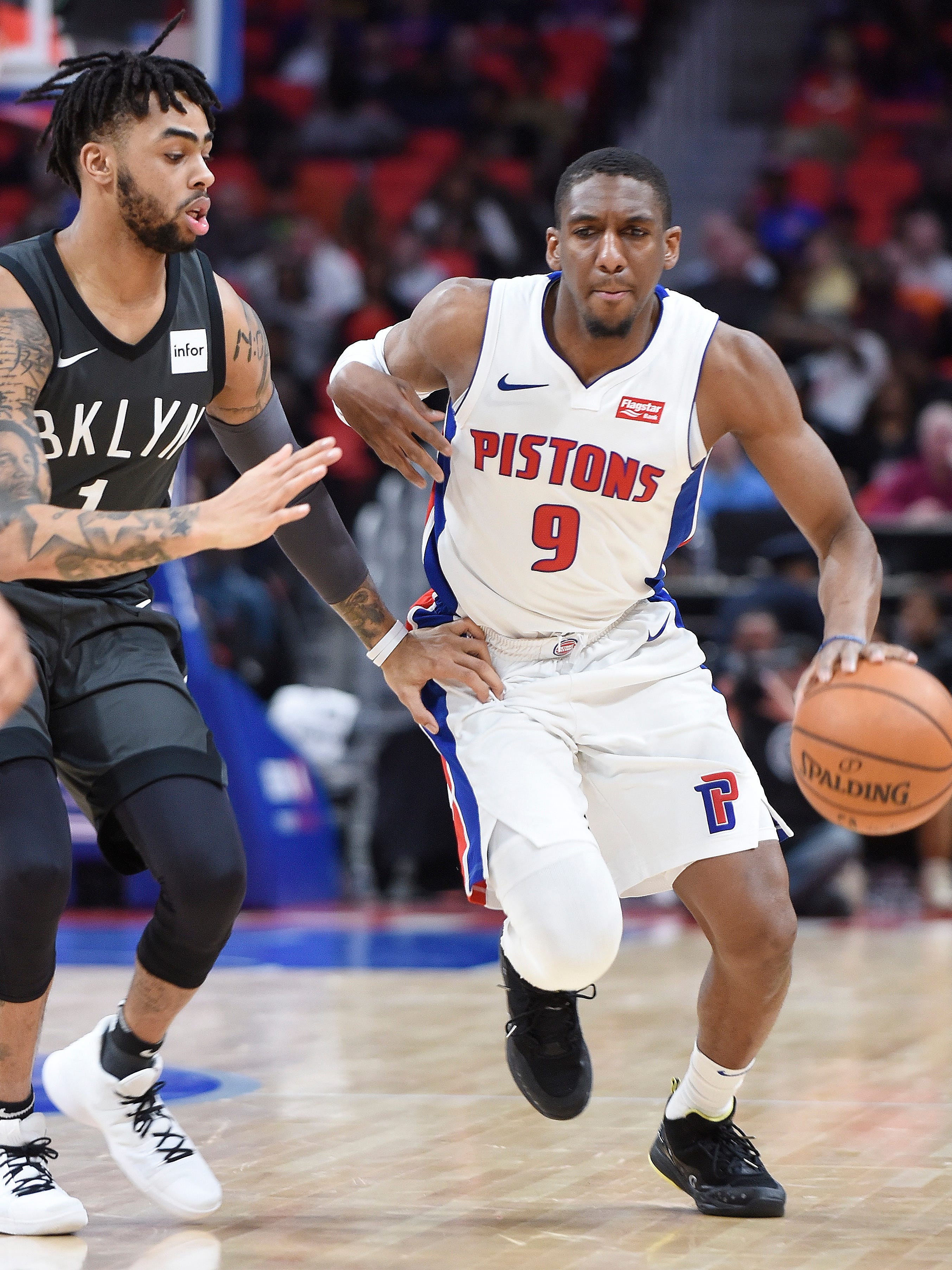 Pistons' Langston Galloway drives past Nets' D' Angelo Russell in the third quarter.