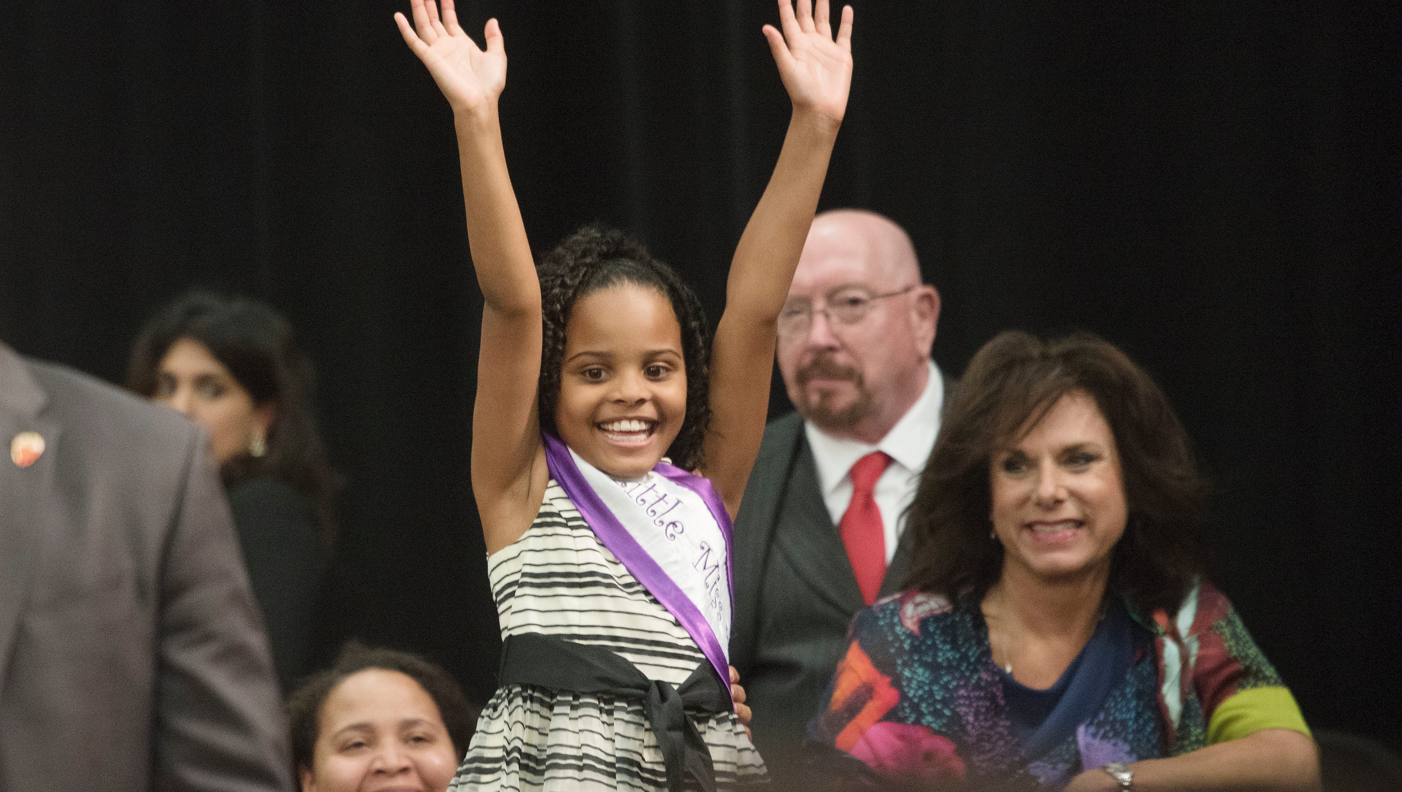 "Little Miss Flint" Mari Copeny acknowledges President Barack Obama when he mentioned her during his remarks. It was Copeny's letter to the president that prompted his visit to Flint.