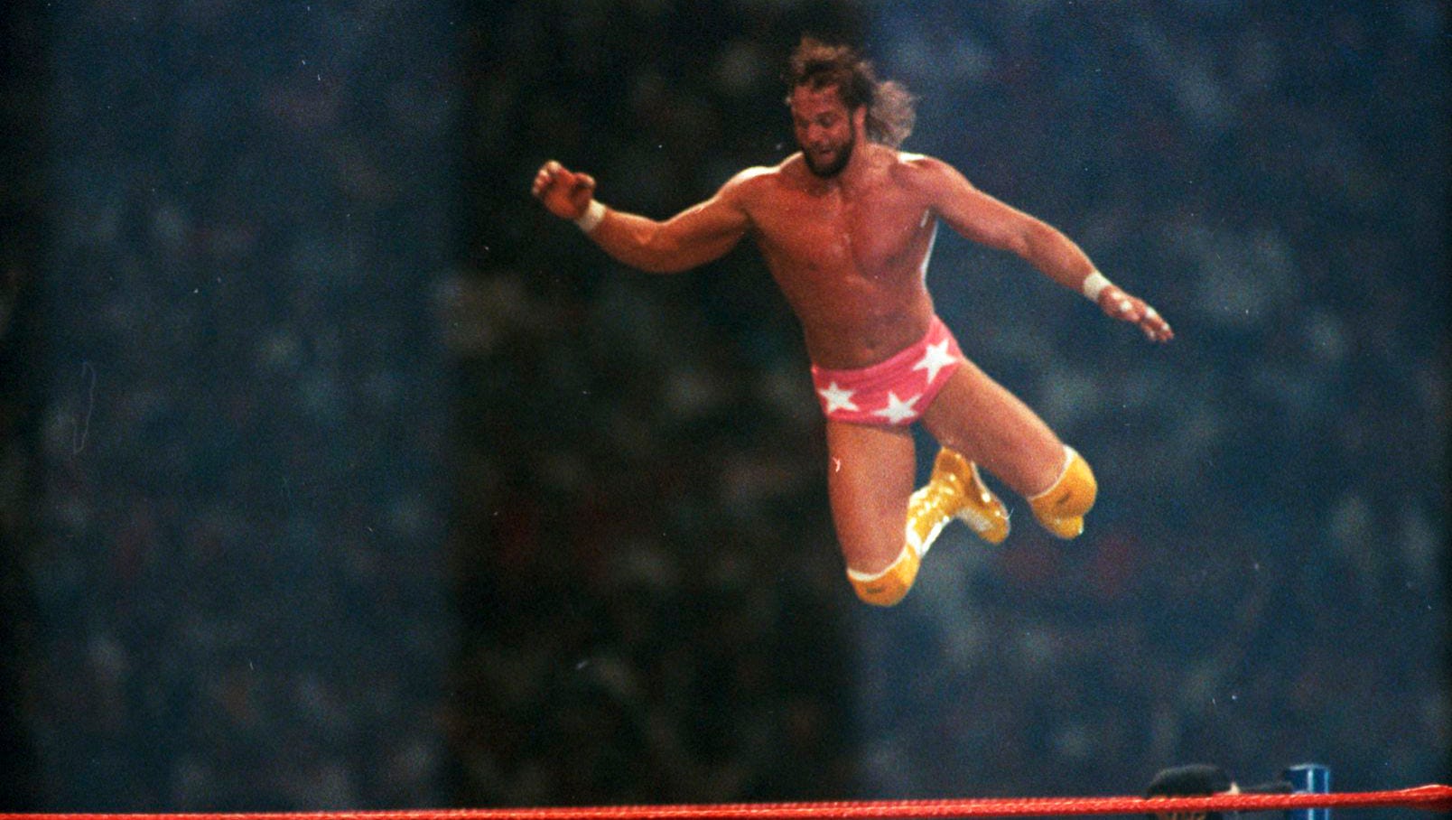 Randy "Macho Man" Savage goes flying off the top rope during his epic match with Ricky "The Dragon" Steamboat.