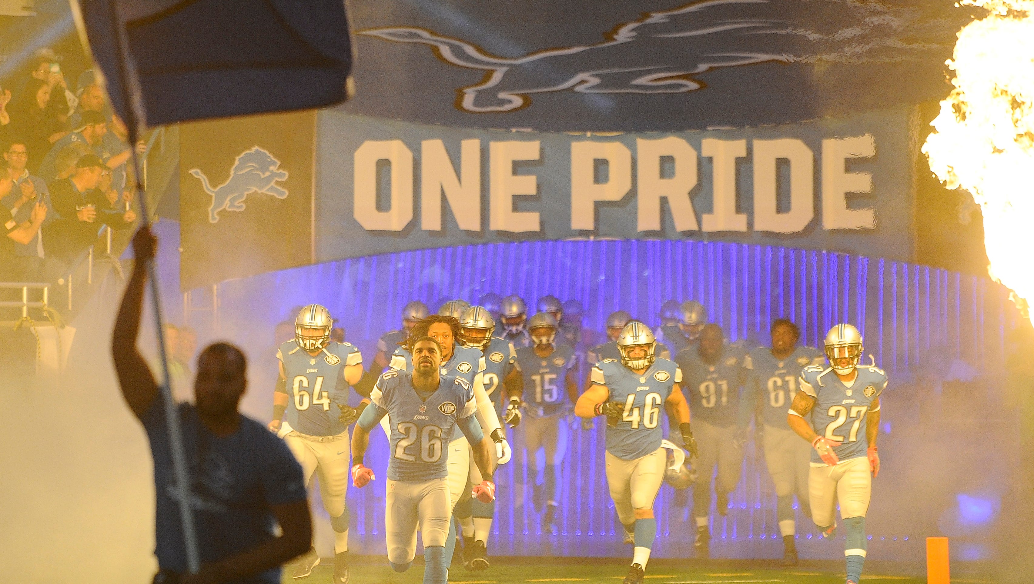 The Detroit Lions make their way onto the field for the game against the Los Angeles Rams at Ford Field.