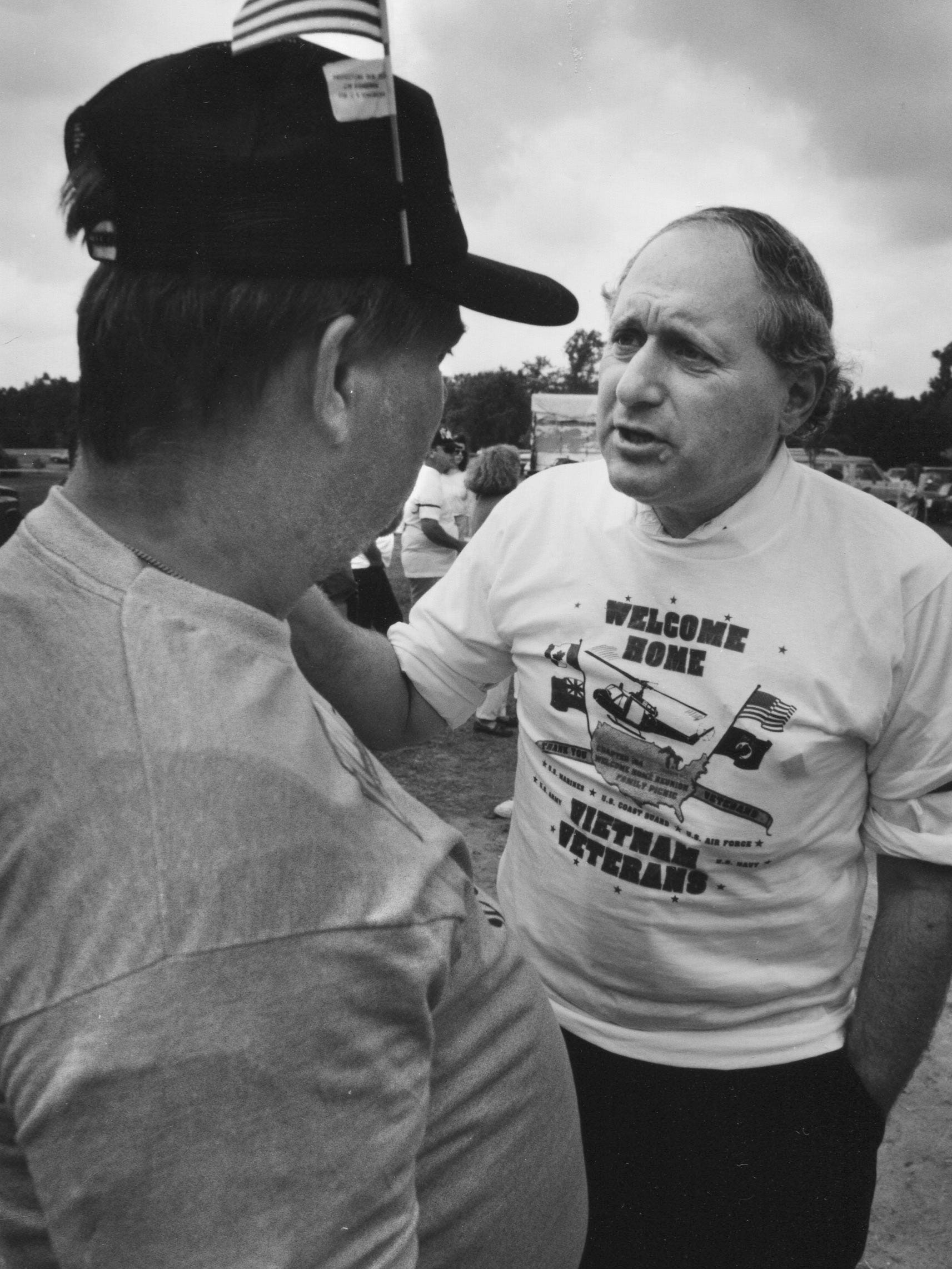Sen. Carl Levin campaigns at a Vietnam veterans picnic in July 1990.