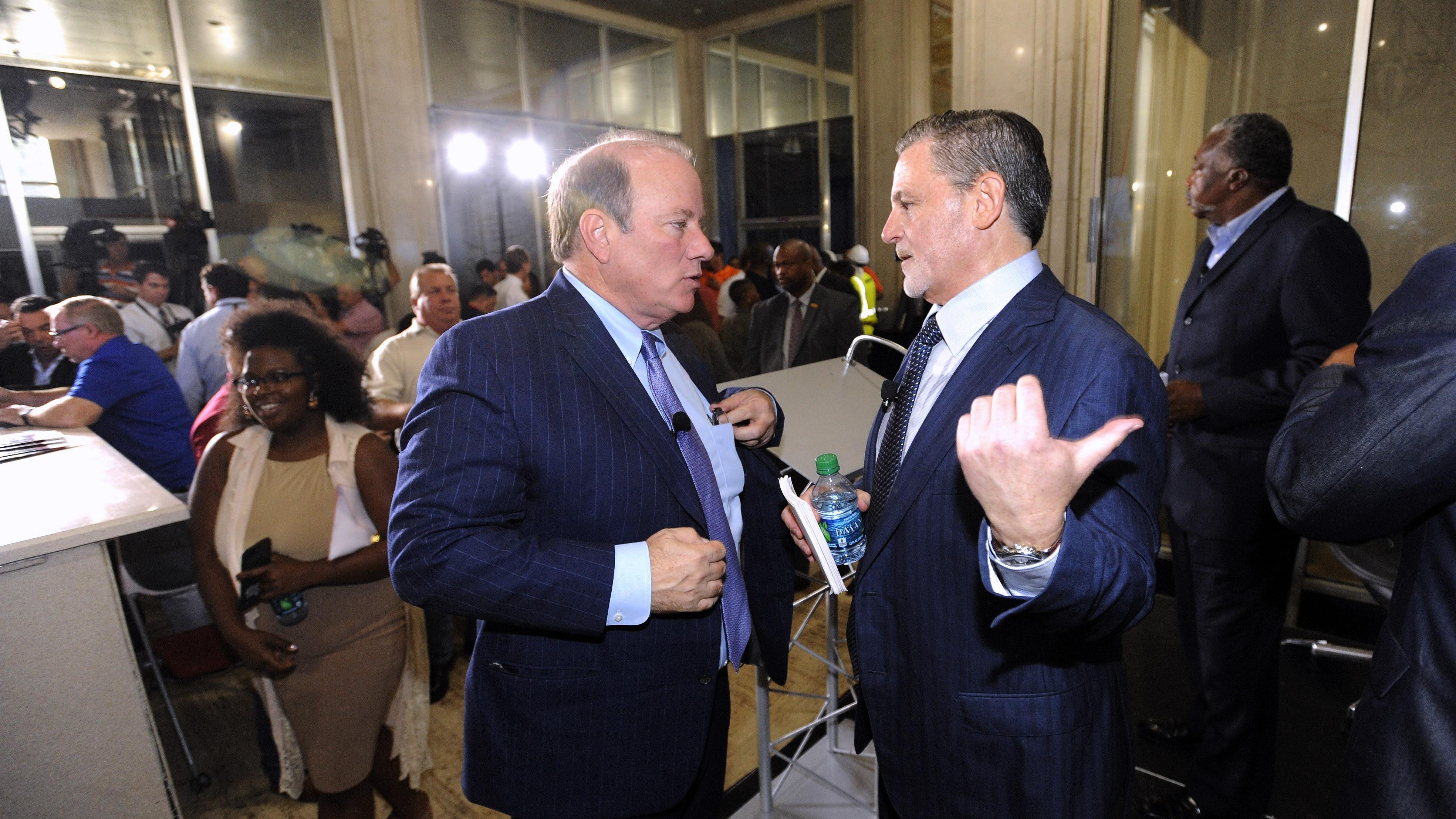 Detroit Mayor Mike Duggan, left, and Quicken Loans Inc. Chairman Dan Gilbert on Wednesday.