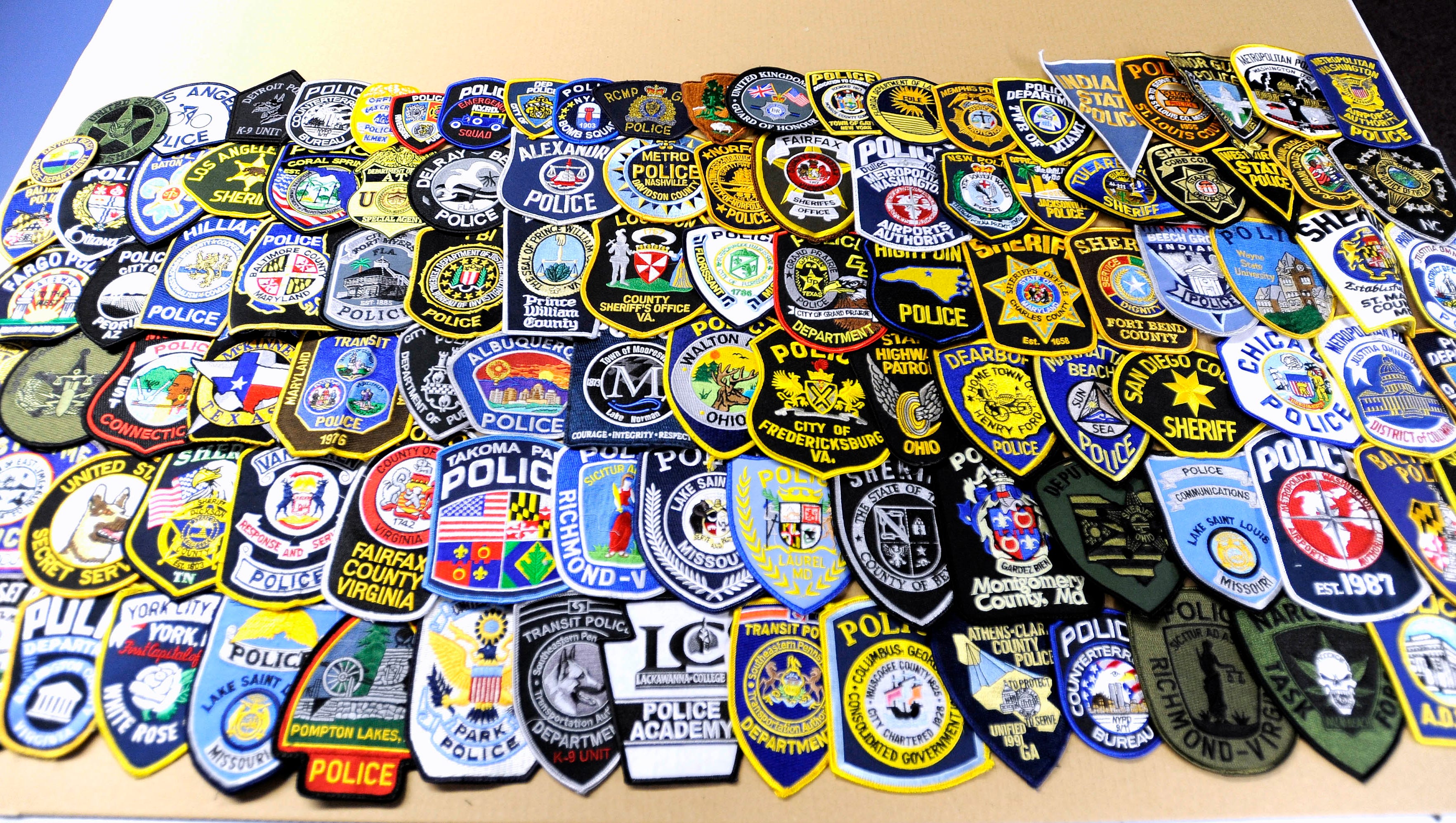 These are police shoulder patches that were given to TBL USA president and founder Andrew Jacob and vice president Pete Forhan by officers from the U.S. and Europe during their visit to Washington, D.C. for National Police Week earlier this week.