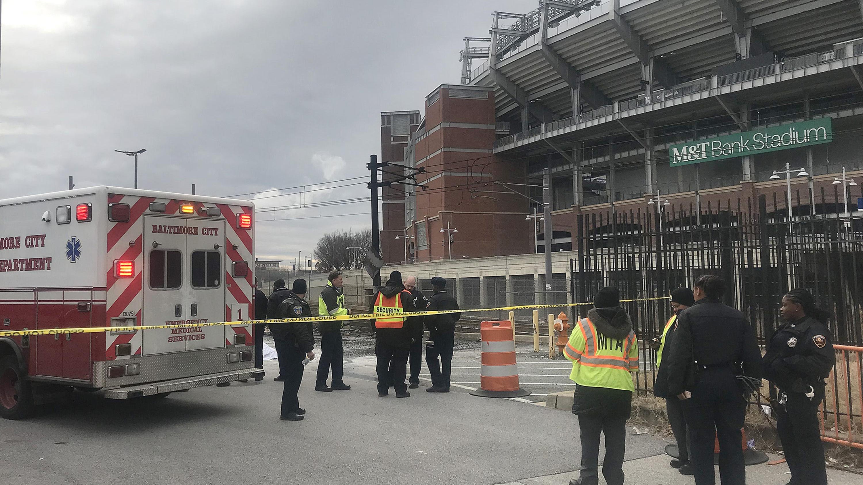 A man died after being engulfed in flames and running from a portable toilet that was also on fire in the parking lot of M&T Bank Stadium in Baltimore Sunday afternoon.