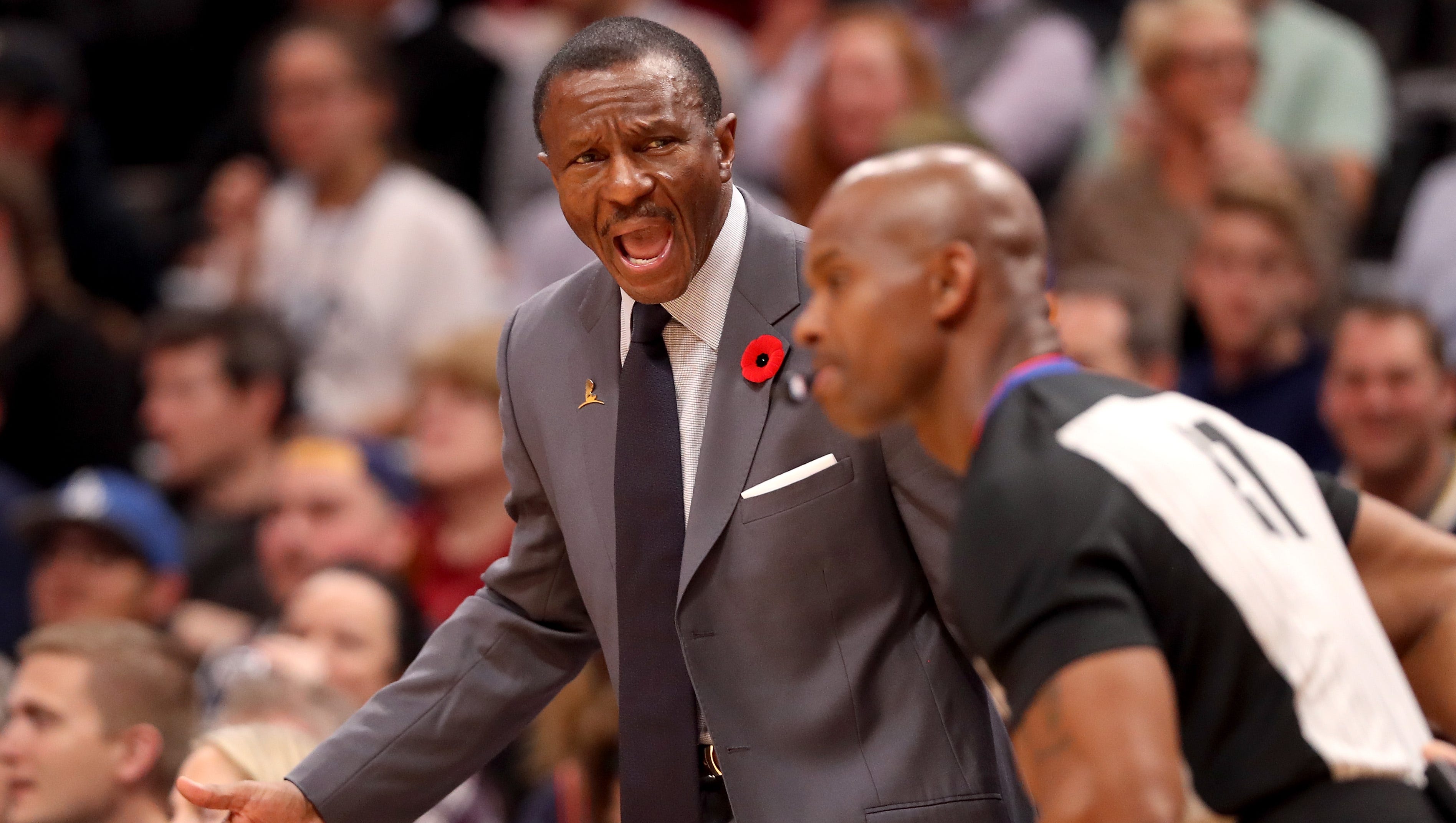 Head coach Dwane Casey of the Toronto Raptors shouts instructions to his team as they play the Denver Nuggets at the Pepsi Center on November 1, 2017 in Denver, Colorado.
