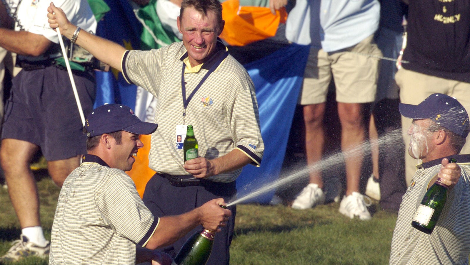 Team Europe's Paul Casey sprays Thomas Levet with champagne on the 18th hole after winning the 2004 Ryder Cup.