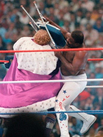After losing to "King" Harley Race in a match where the loser had to "bow" to his opponent, the Junkyard Dog decided a smash with a folding chair was more appropriate.