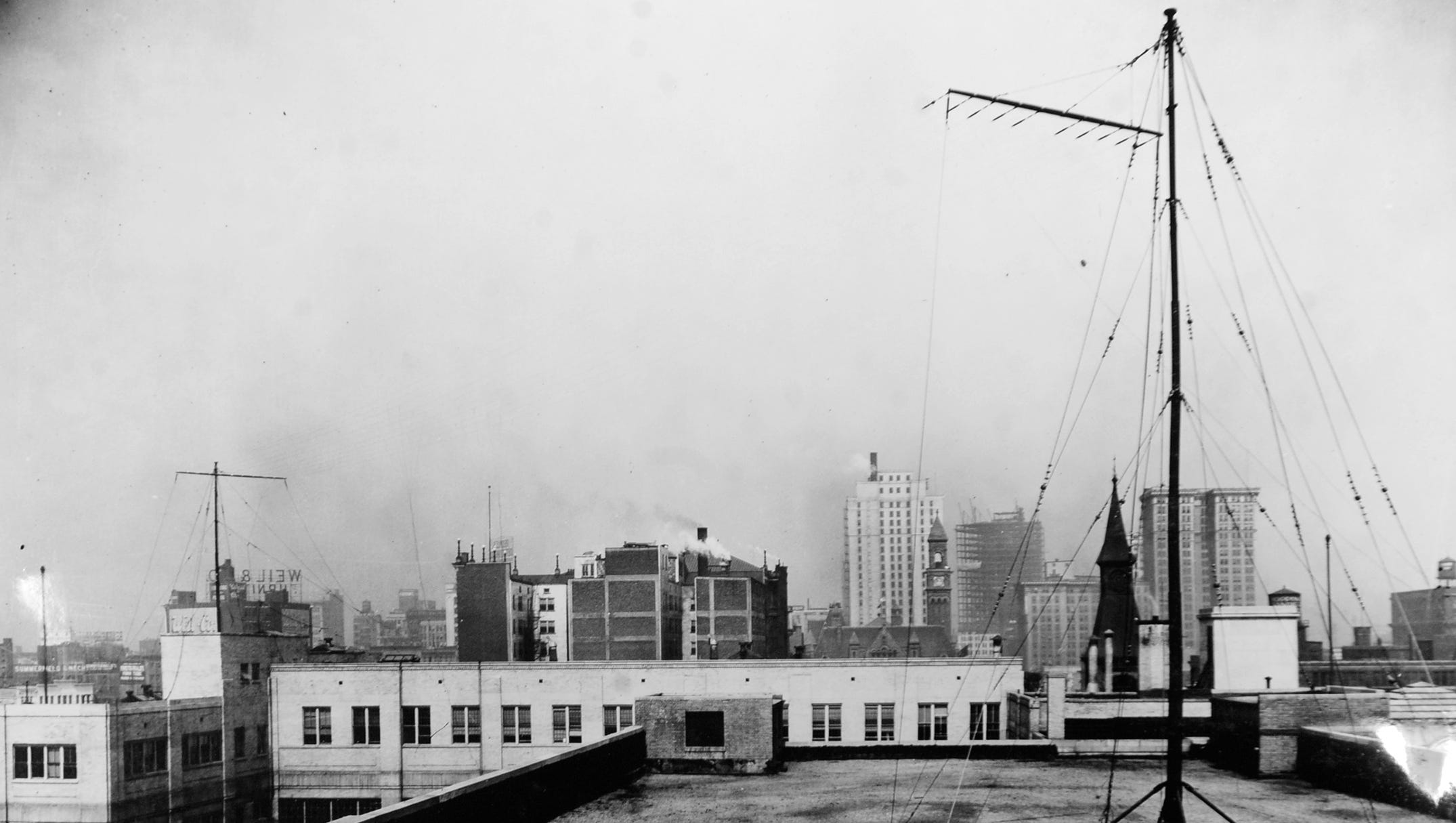 The radio station's antenna stands atop the Detroit News building, 290 feet above street level, in June, 1921.