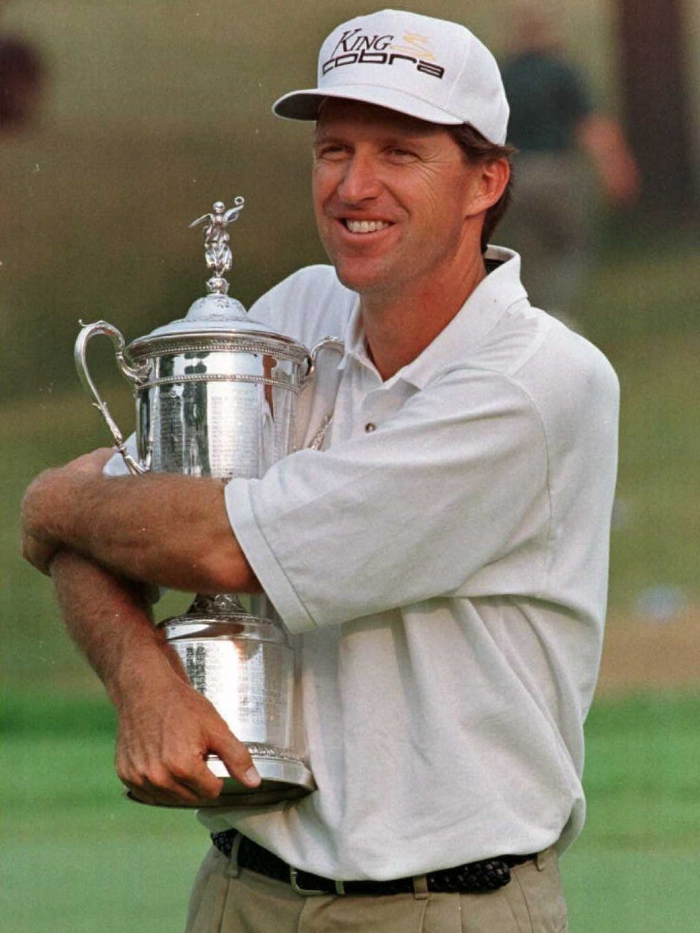 Steve Jones cradles the U.S. Open trophy at the 1996 playing at Oakland Hills.