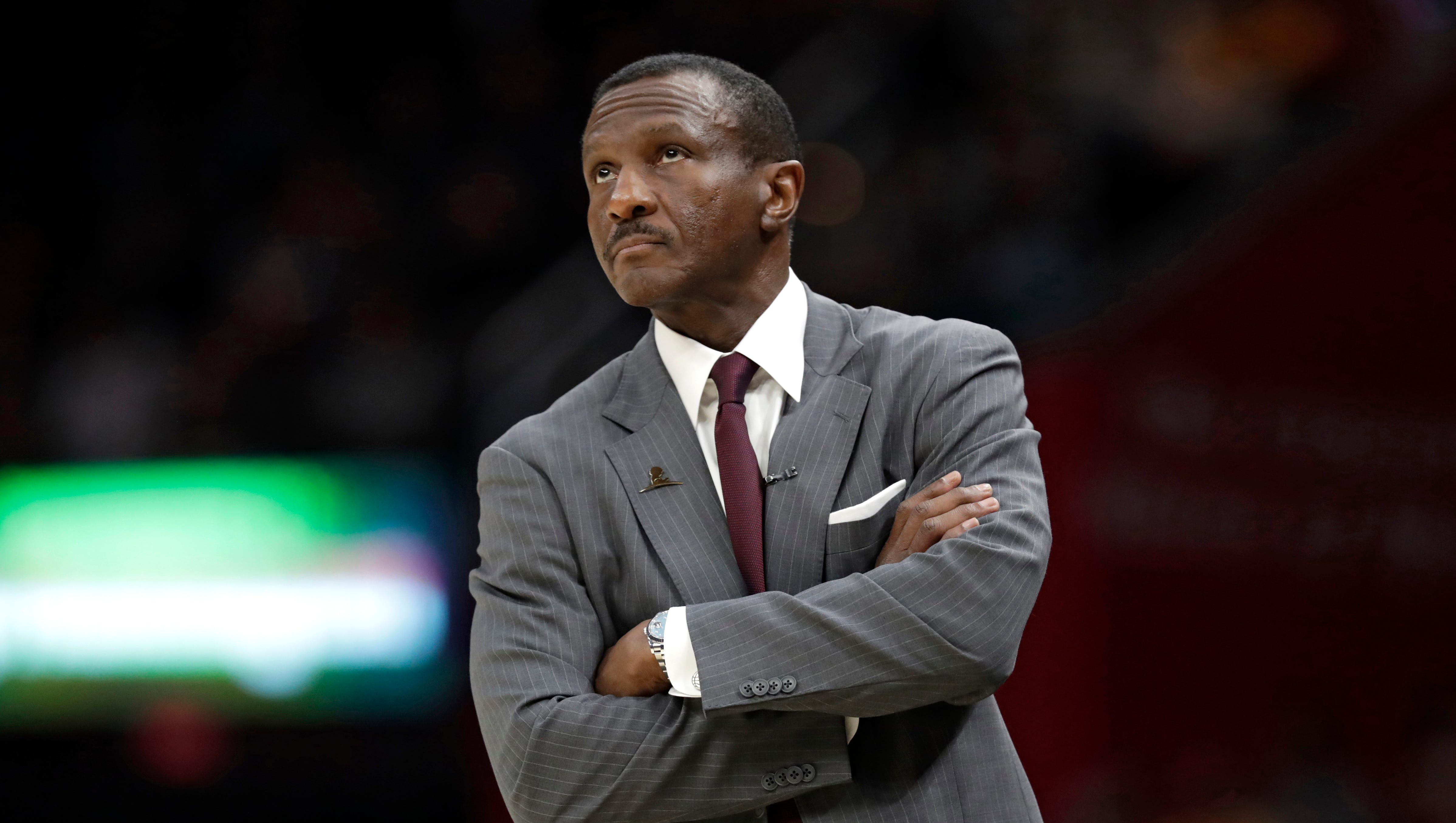 Toronto Raptors head coach Dwane Casey looks up in the first half of an NBA basketball game against the Cleveland Cavaliers, Wednesday, March 21, 2018, in Cleveland.
