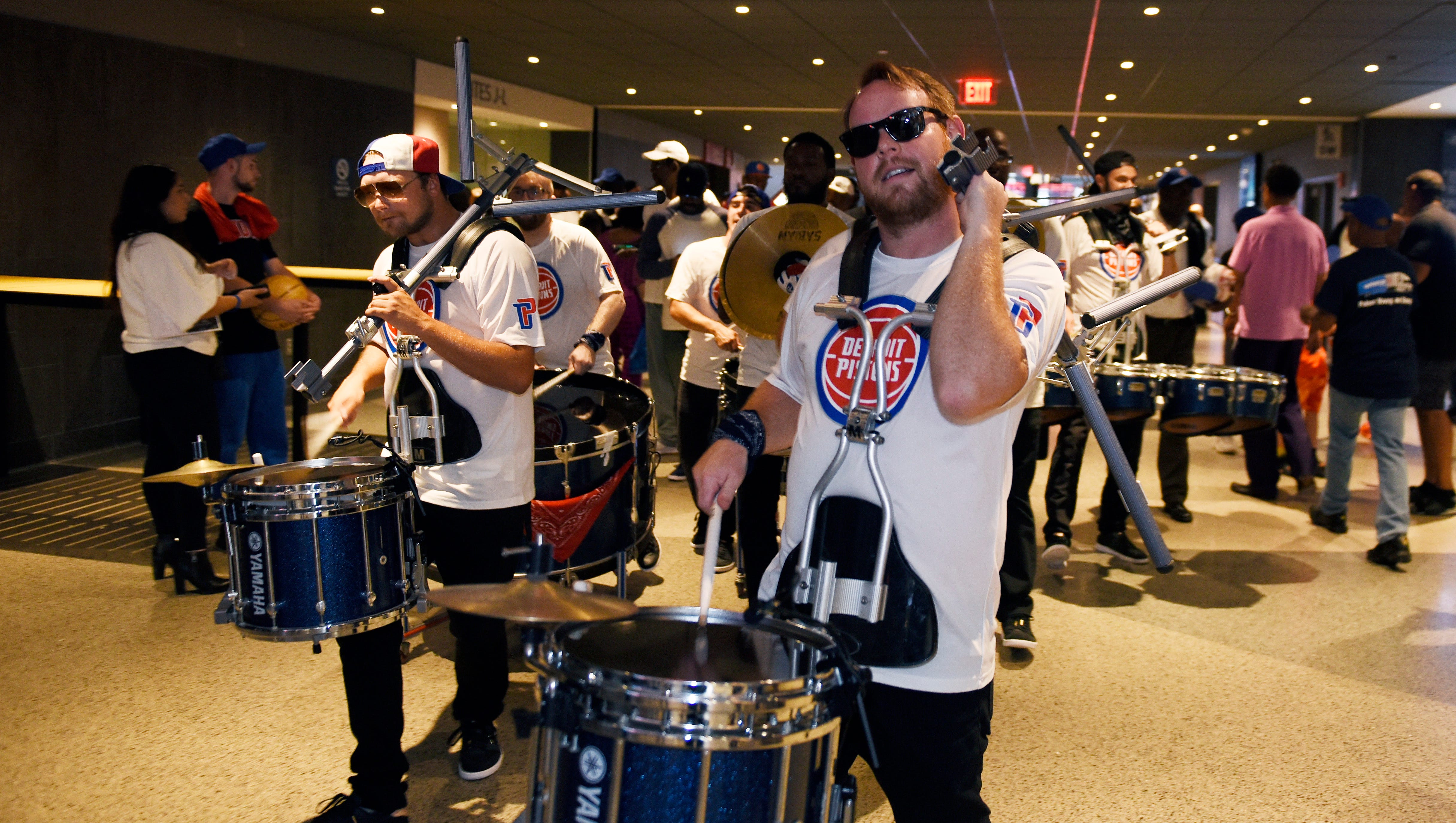 Drumline team plays in the main concourse at the Pistons Meet the Team event.