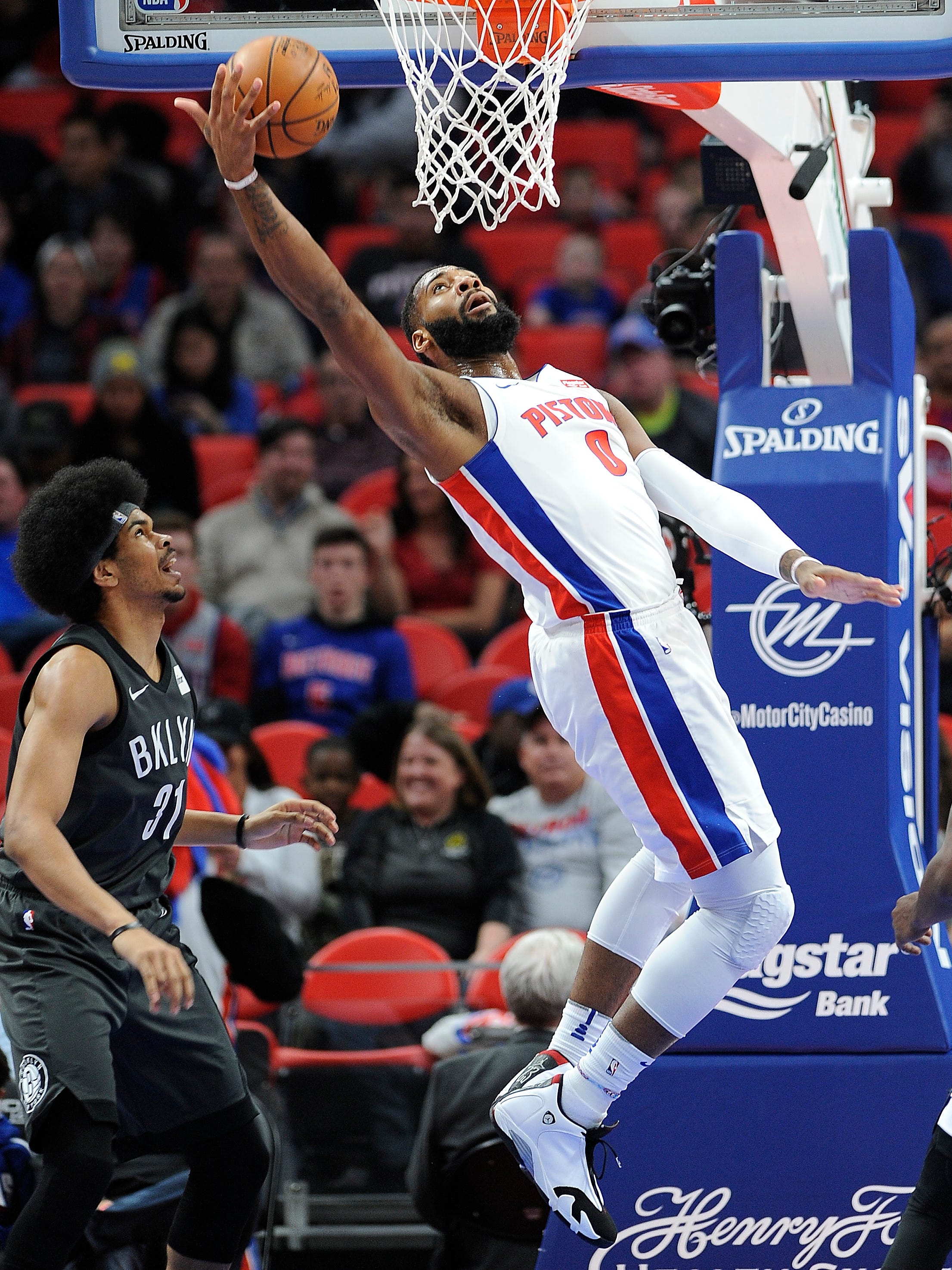 Pistons' Andre Drummond grabs a rebound over Nets' Jarrett Allen in the second quarter. Drummond had 17 points and a season-high 27 rebounds.