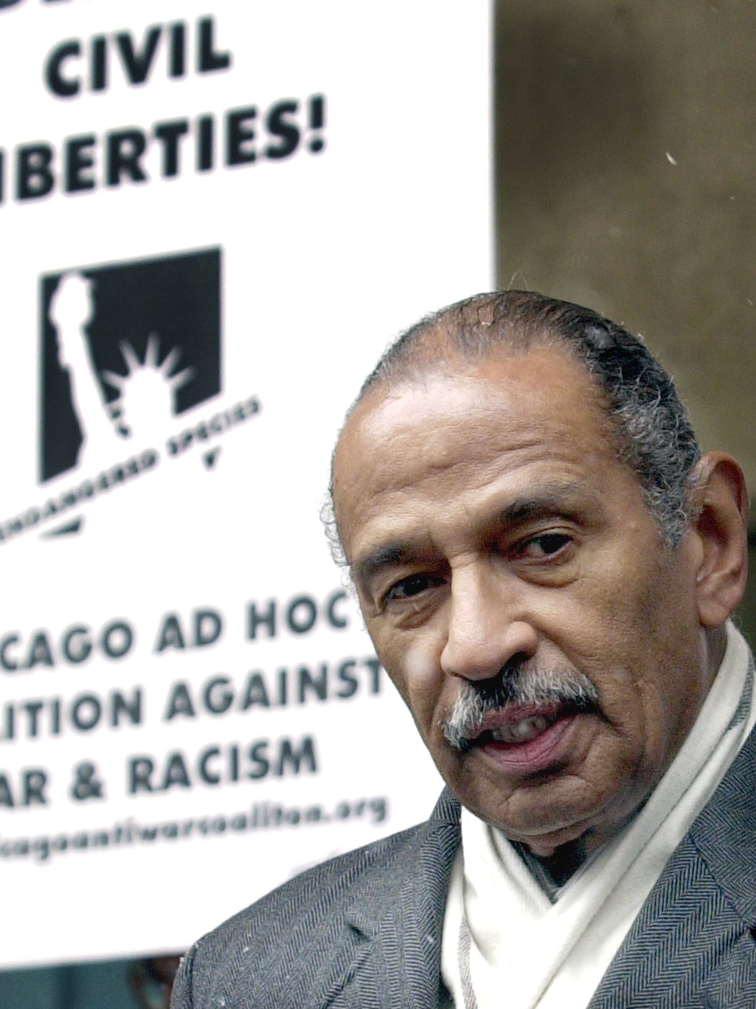 In 2002, Conyers, the ranking member of the House Judiciary Committee, talks about his visit with Muslim cleric Rabih Haddad, outside the Chicago jail where Haddad was being held. After visiting the co-founder of an Islamic charity closed down as part of the terrorism investigation, Conyers said, "There does not on the surface seem to be any reason why he should not be released on his own recognizance."