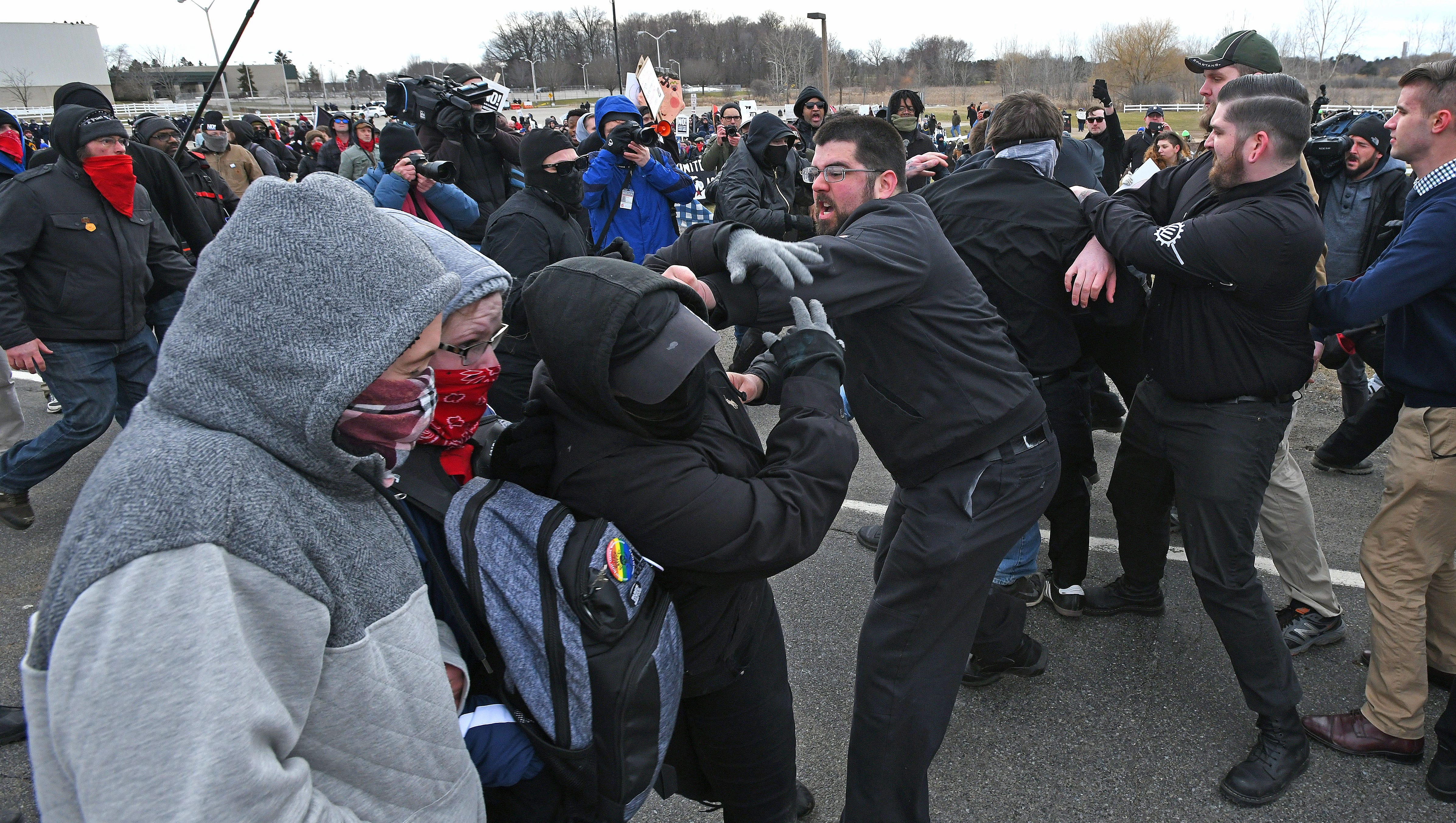 Protesters, left, clash with Spencer sympathizers, right side, outside the MSU Pavilion.