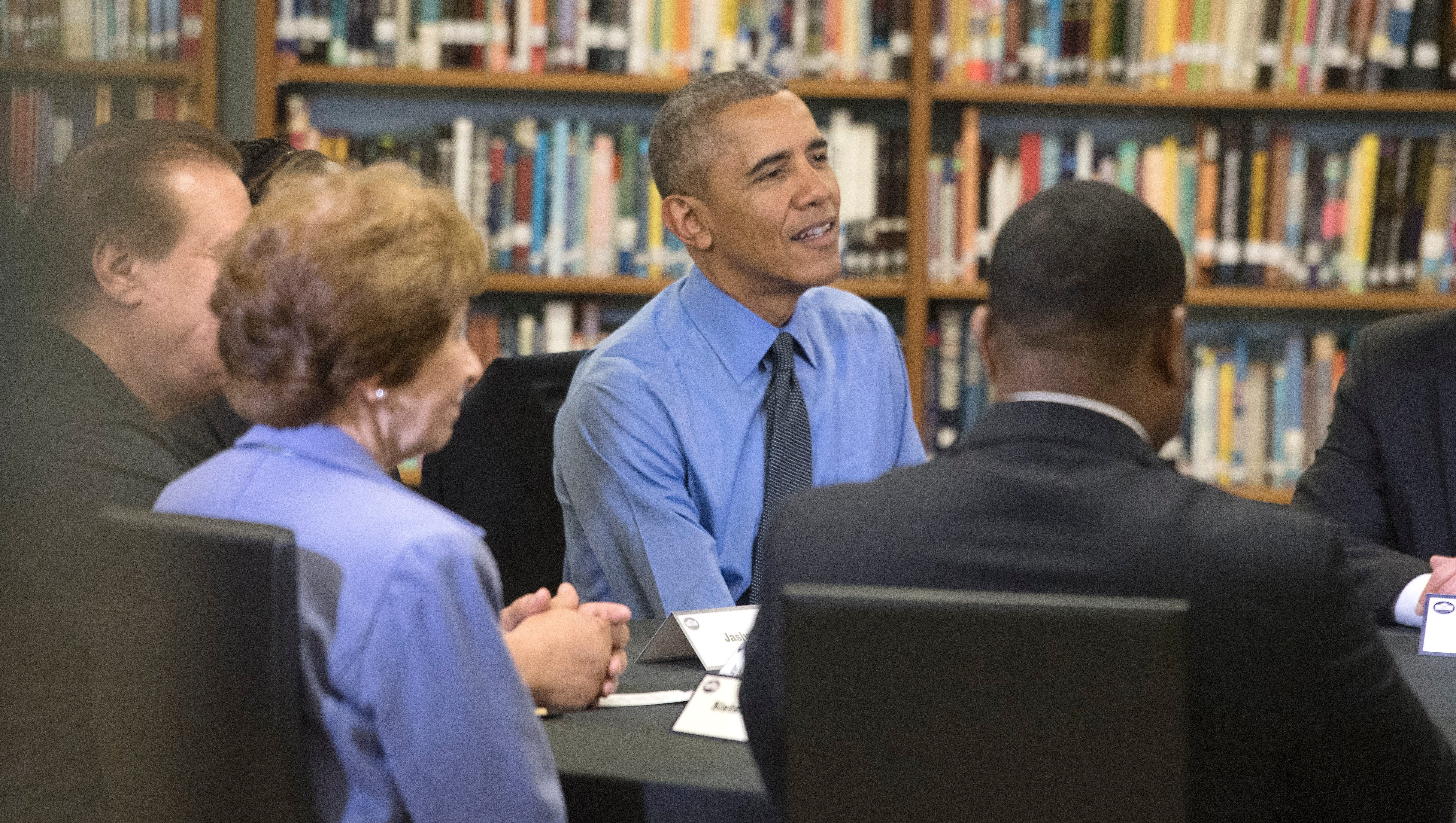 President Obama takes part in a round table discussion with Flint residents.