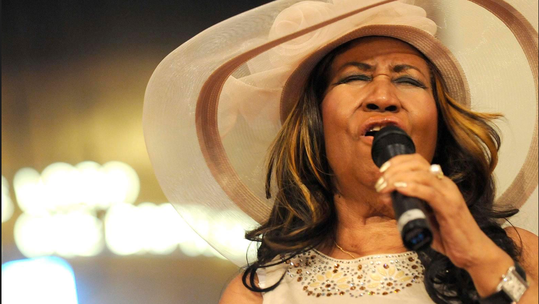 Aretha Franklin sings during a memorial service for her father and brother, Rev. C.L. and Rev. Cecil Franklin, at New Bethel Baptist Church in Detroit on Sunday, June 7, 2015.