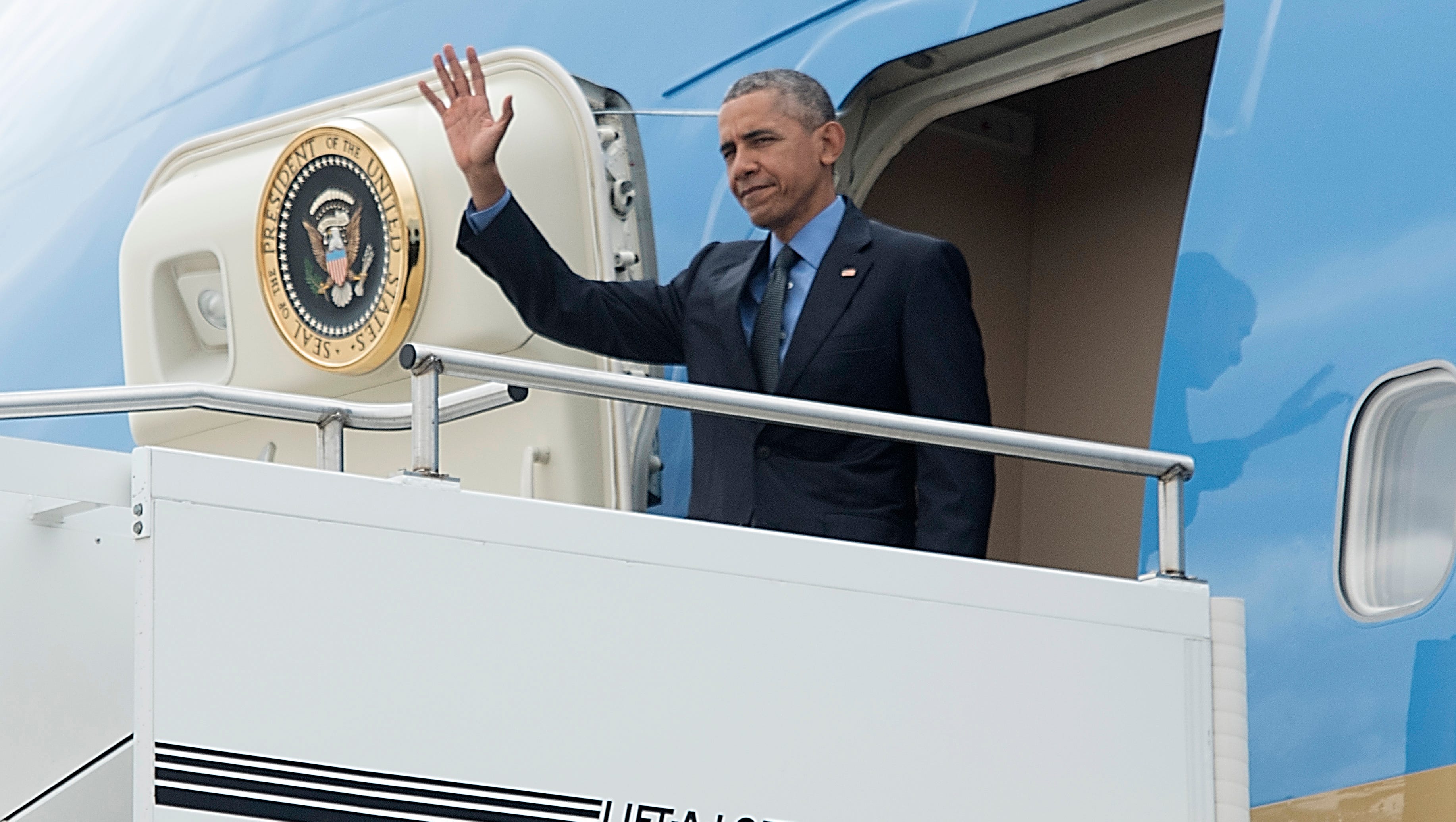 President Barack Obama arrives at Bishop International Airport in Air Force One Wednesday afternoon for a visit to Northwestern High School in Flint on May 4, 2016.