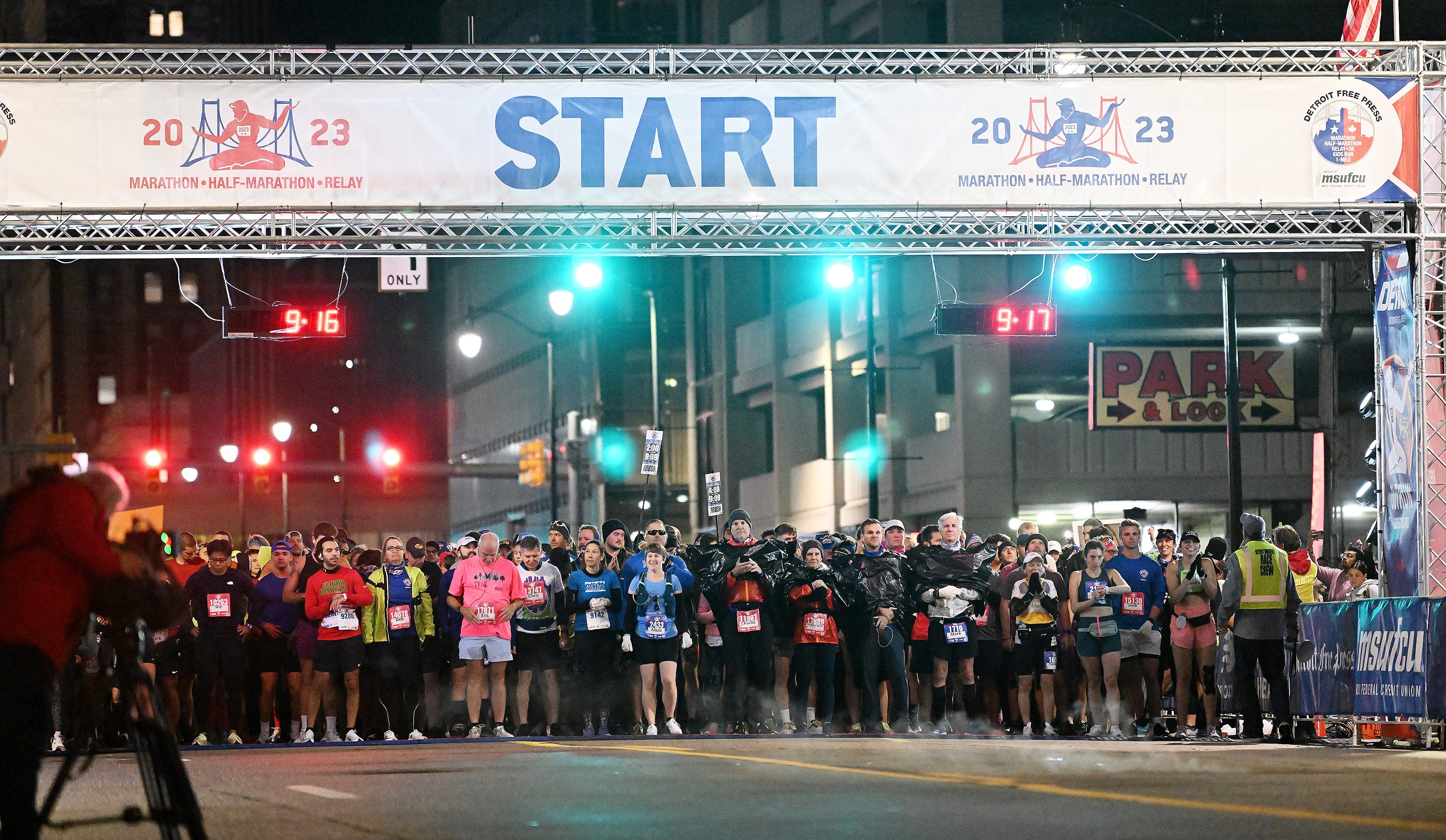 Runners in the second wave get ready to go at the start of the Detroit Free Press Marathon on Fort Street in Detroit on Oct. 15, 2023.