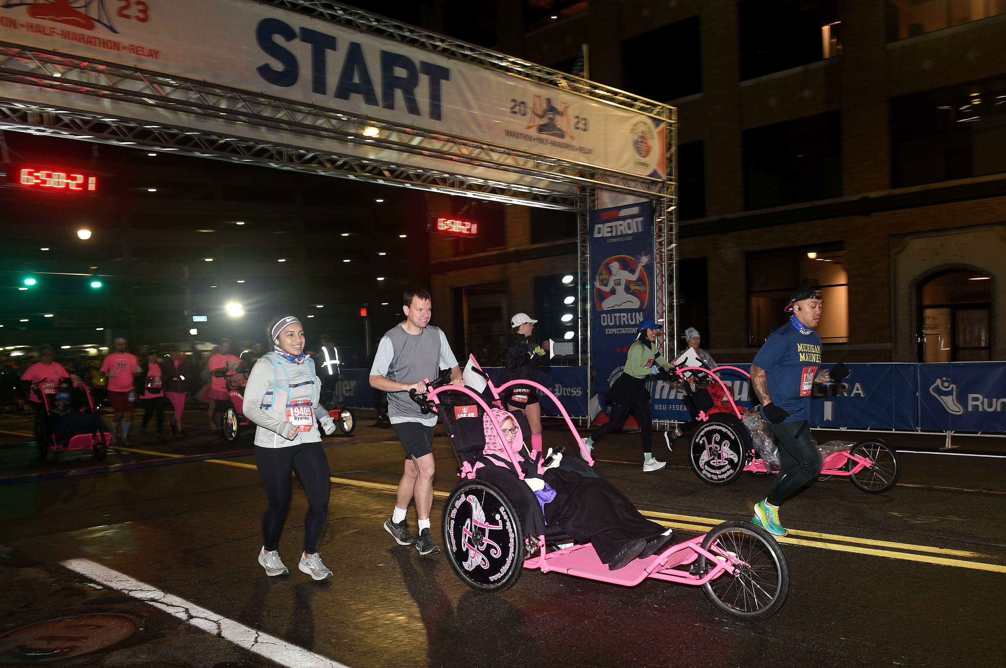 Participants in the wheelchair division at the start of the Detroit Free Press Marathon in Detroit on Oct. 15, 2023.