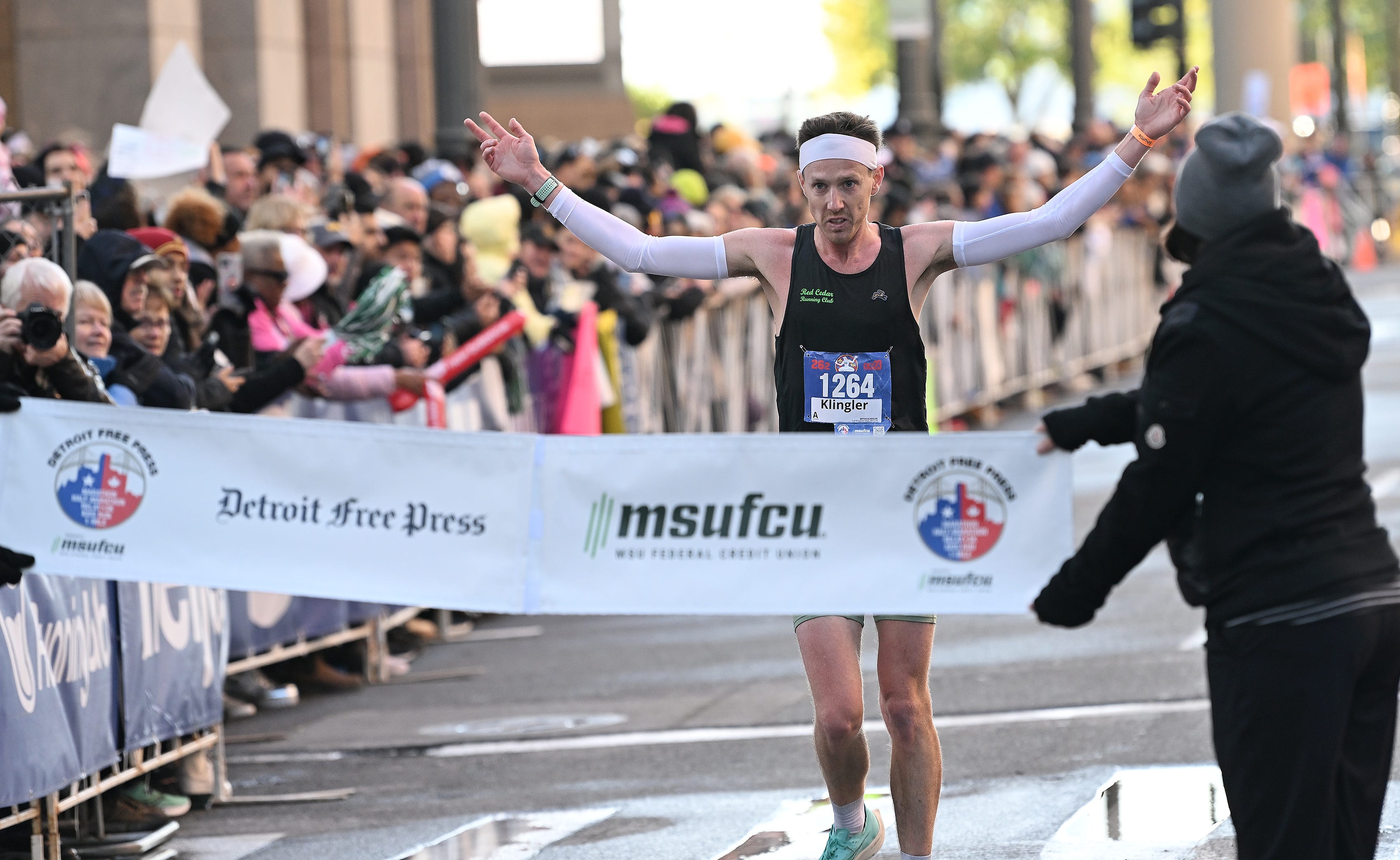 Max Klingler, 31, of Jackson wins the men’s division of the Detroit Free Press Marathon in Detroit on Oct. 15, 2023.