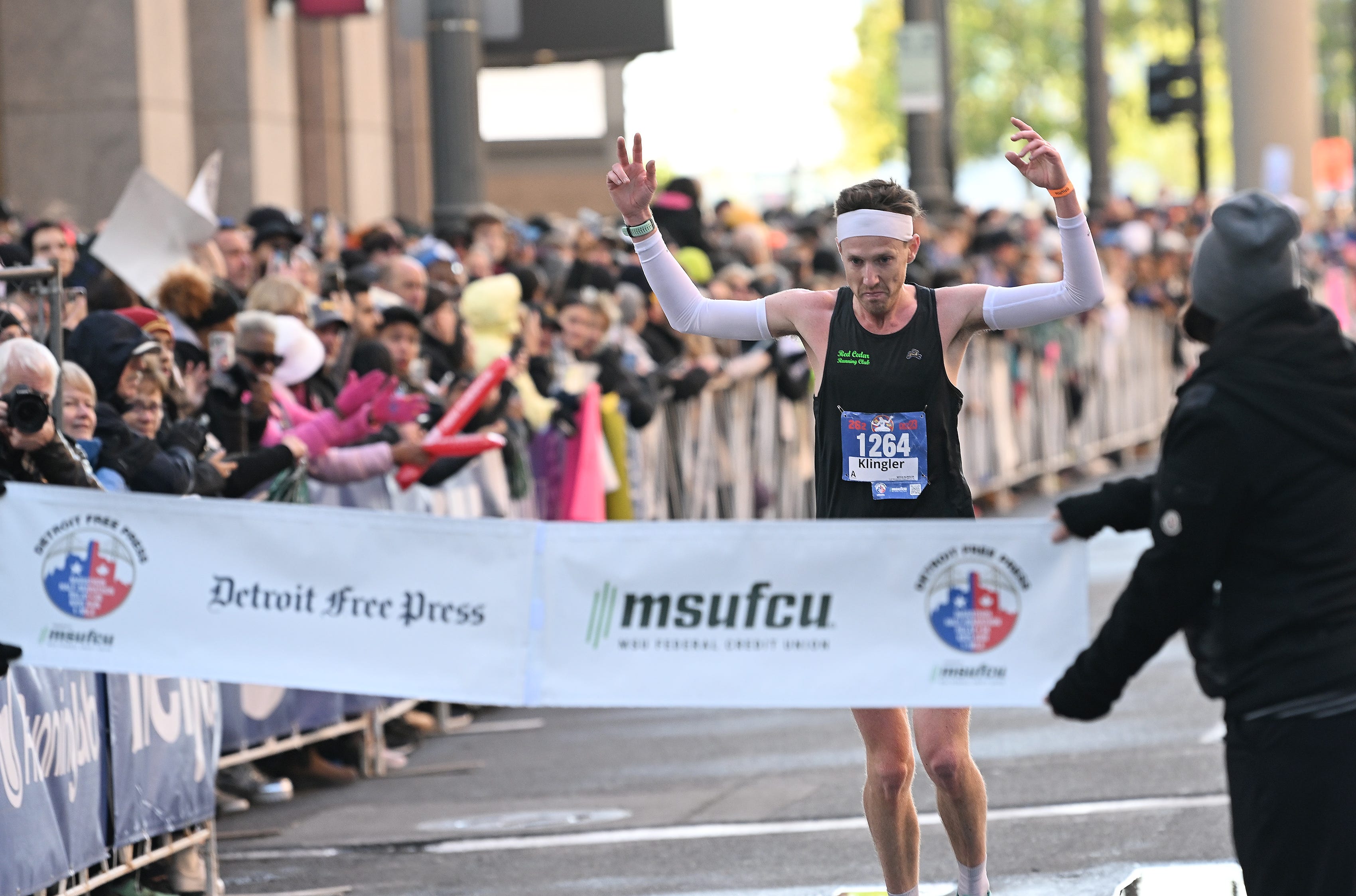 Mitch Klingler, 31, of Jackson wins the men’s division of the Detroit Free Press Marathon in Detroit on Oct. 15, 2023.
