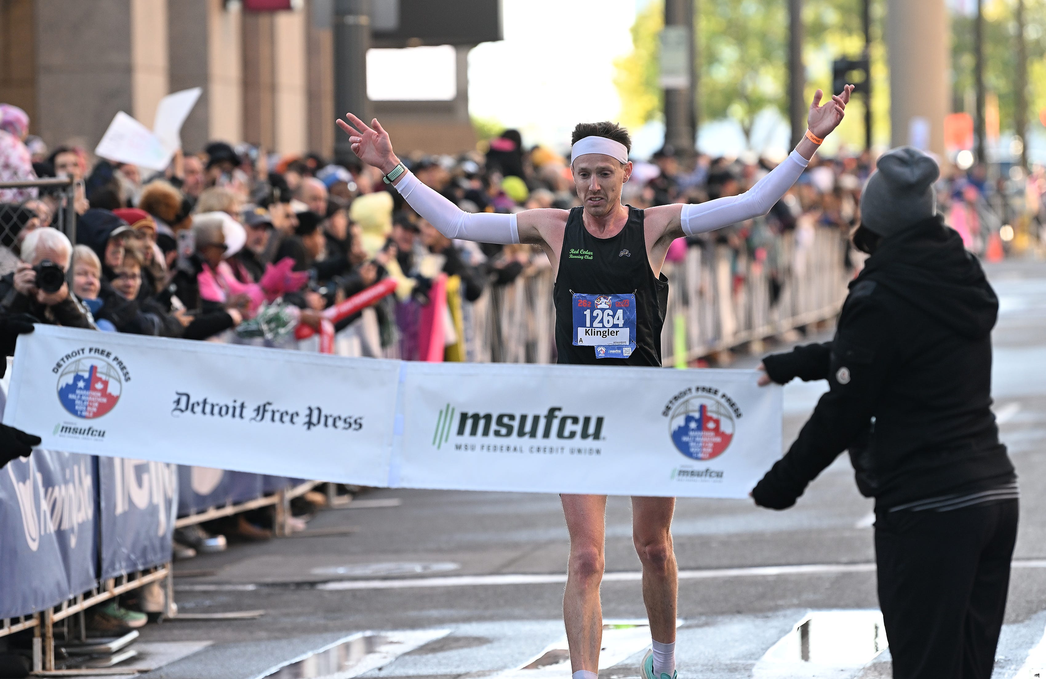 Mitch Klingler, 31, of Jackson wins the men’s division of the Detroit Free Press Marathon in Detroit on Oct. 15, 2023.