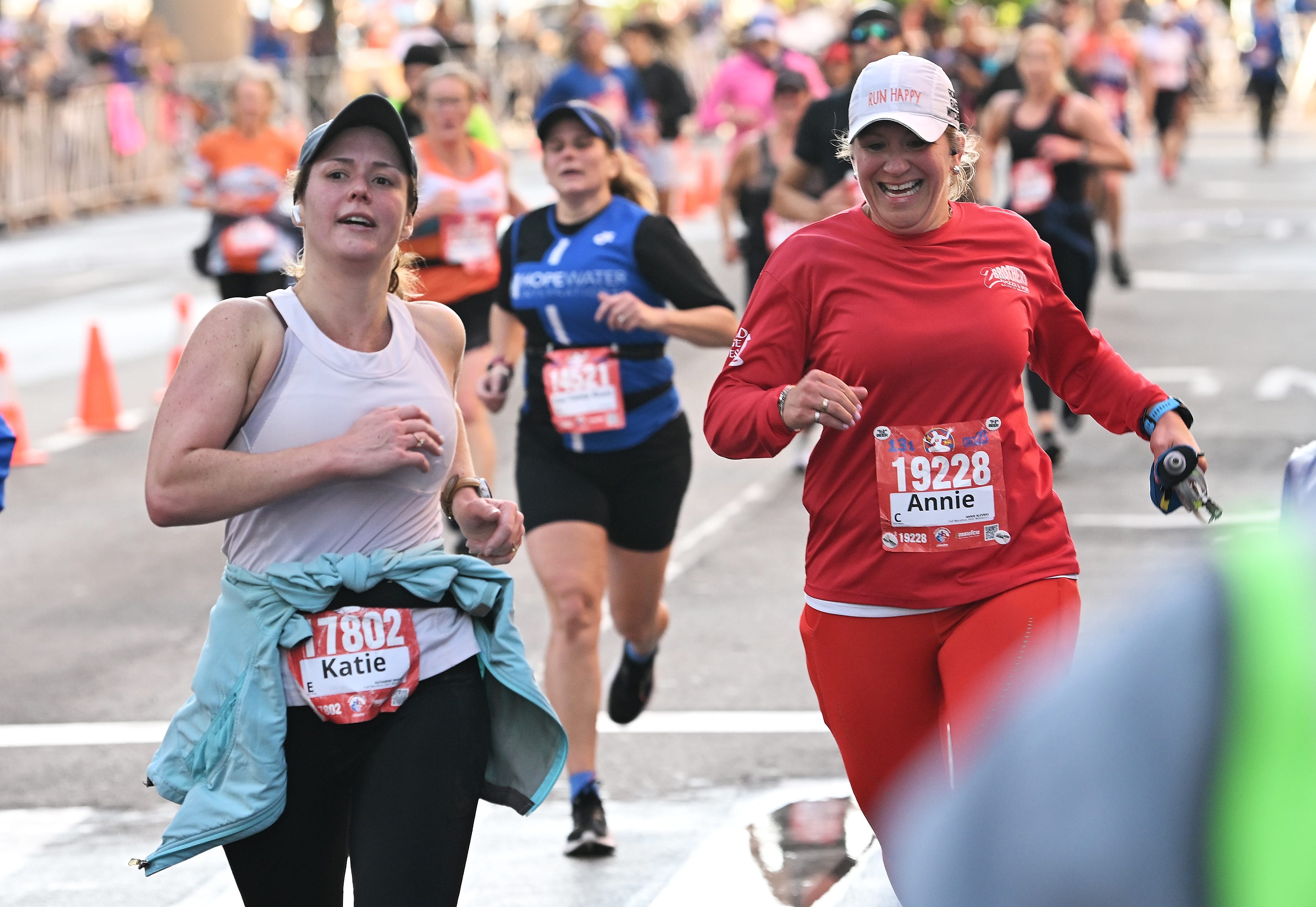 From left, Katharine Wagner, 36, of Bloomfield Hills and Annie Alevras, 47, of Salem, Conn. finish the half marathon.