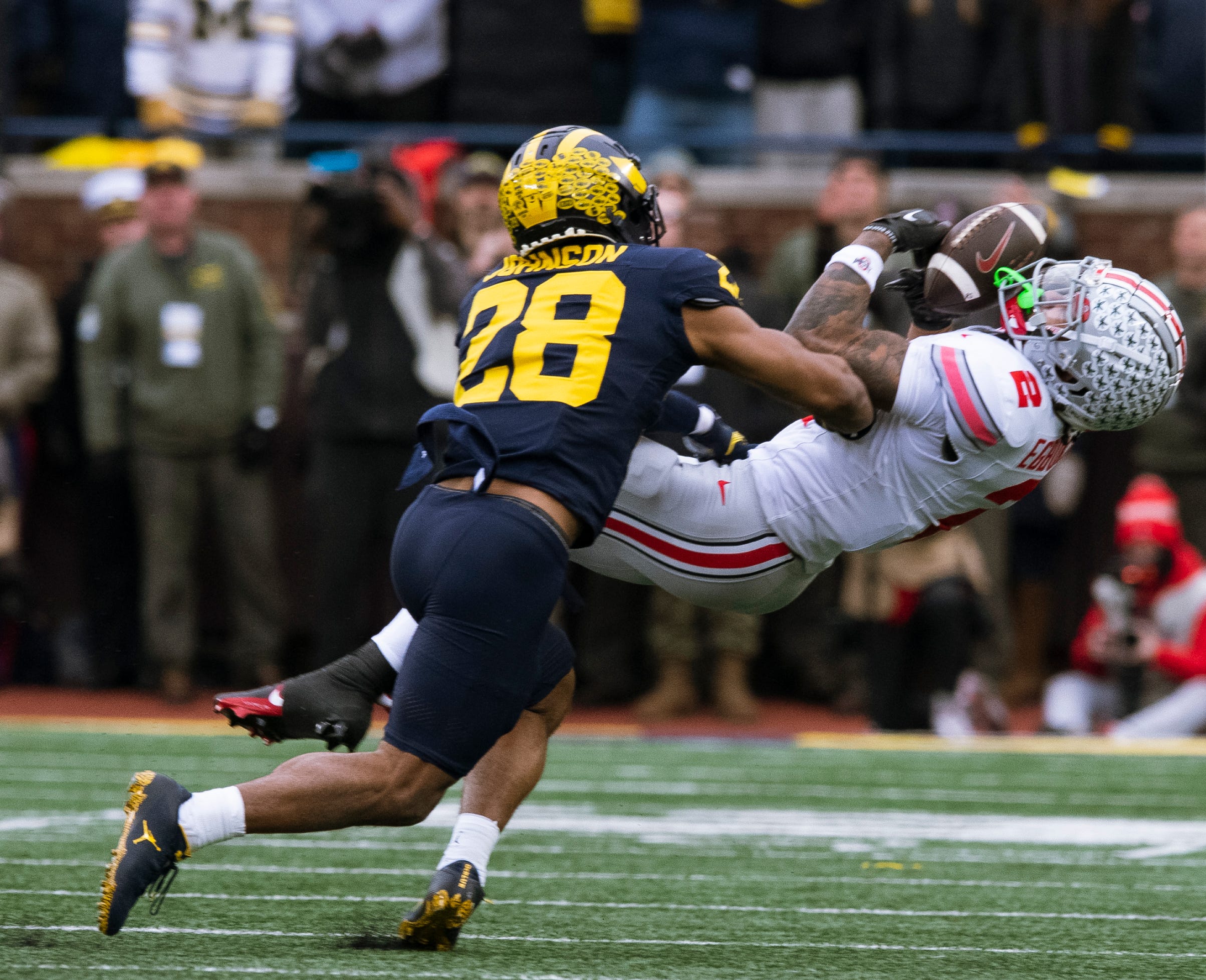 Quinten Johnson had declared for the NFL draft, but he'll be back at Michigan next season.