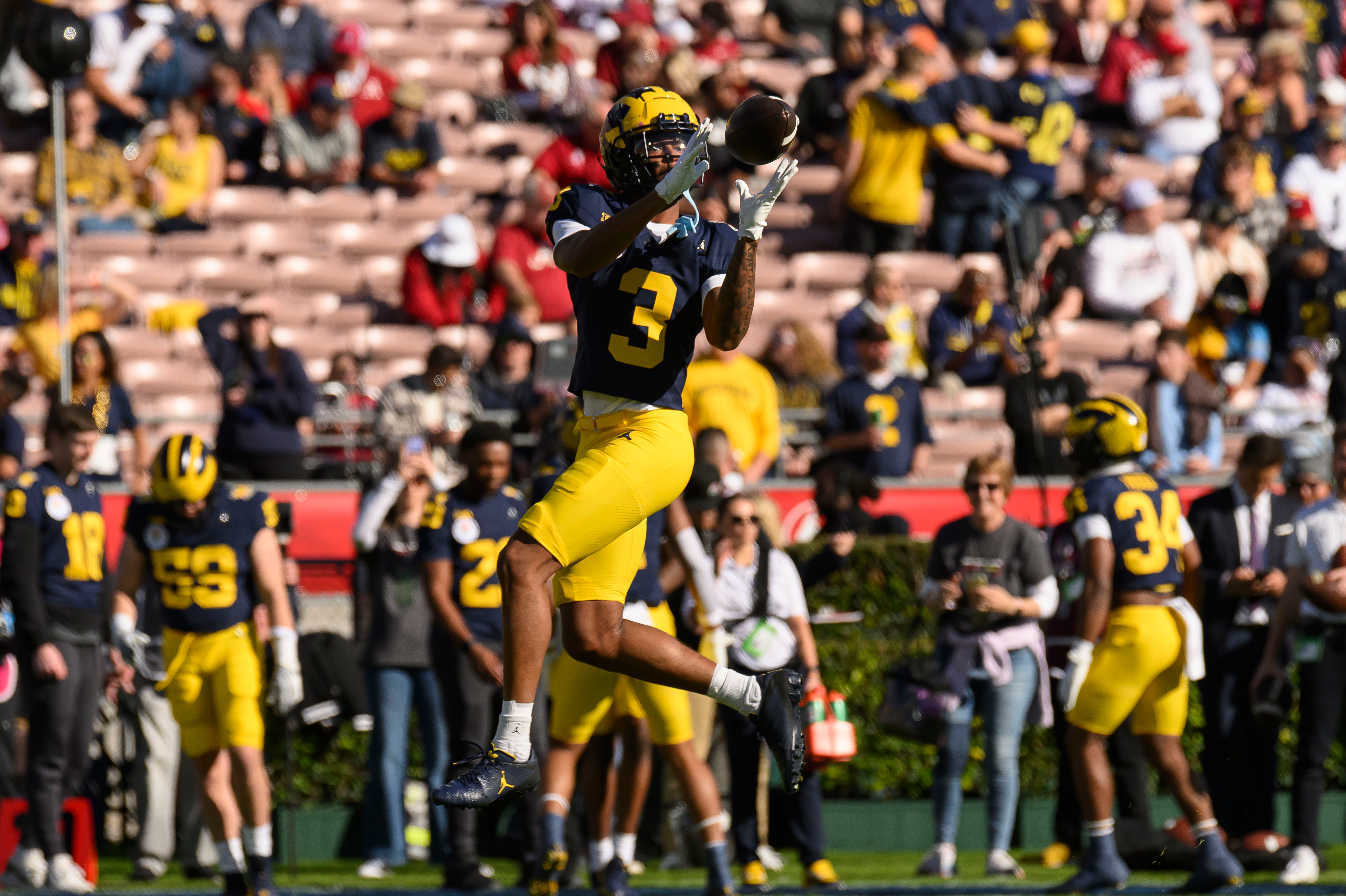 Michigan wide receiver Fredrick Moore catches a pass before the start of the Rose Bowl, in Pasadena, California, January 1, 2024.