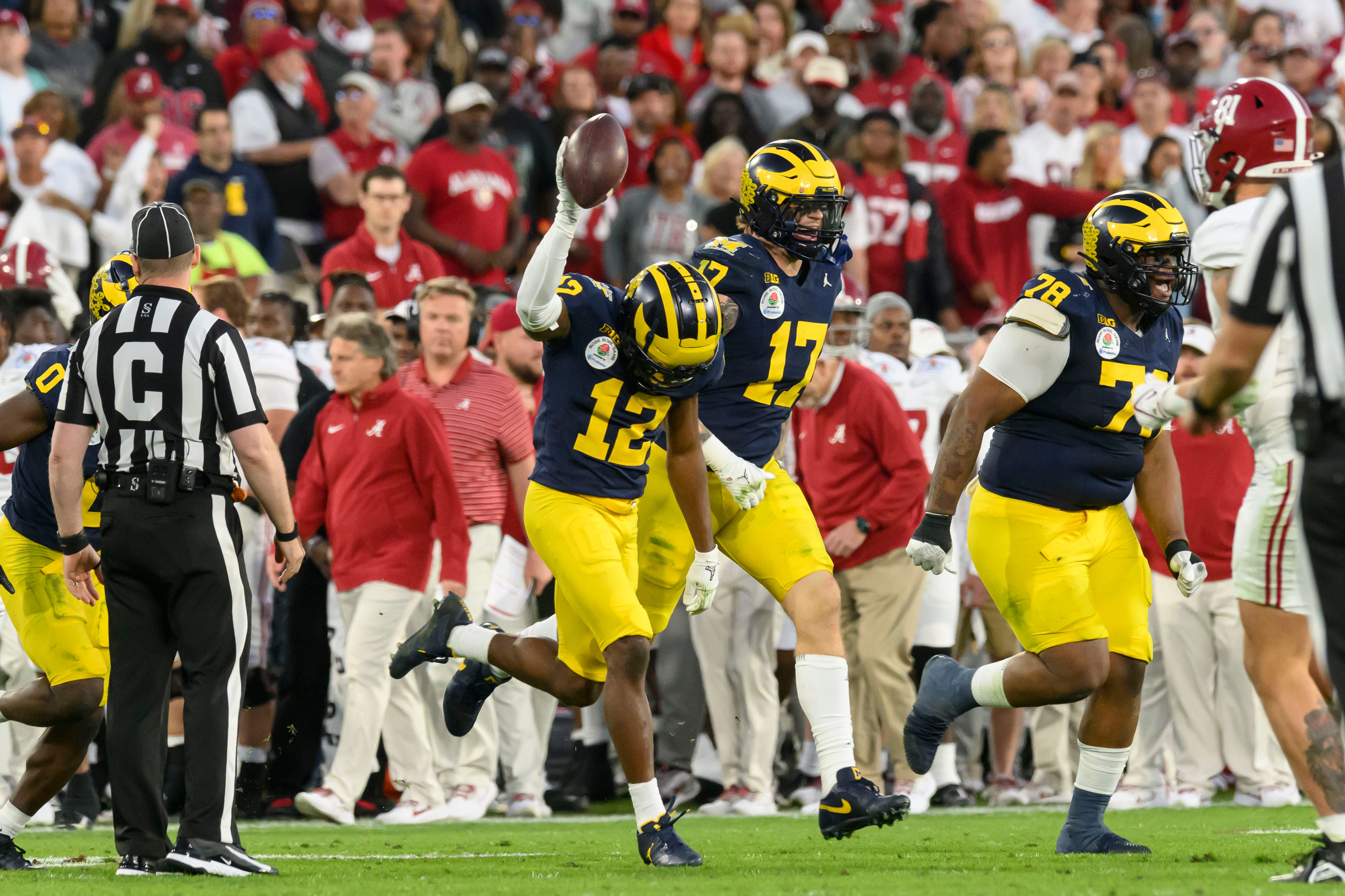 Michigan defensive back Josh Wallace celebrates after recovering an Alabama fumble during the fourth quarter of the Rose Bowl, in Pasadena, California, January 1, 2024.